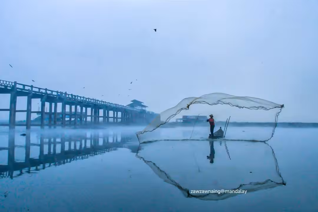 U Bein Bridge and fisherman