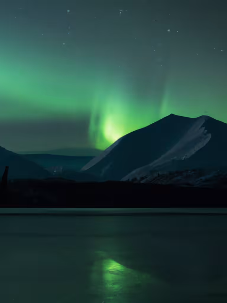Northern Lights Over Snow Capped Mountain Lake - Third Take