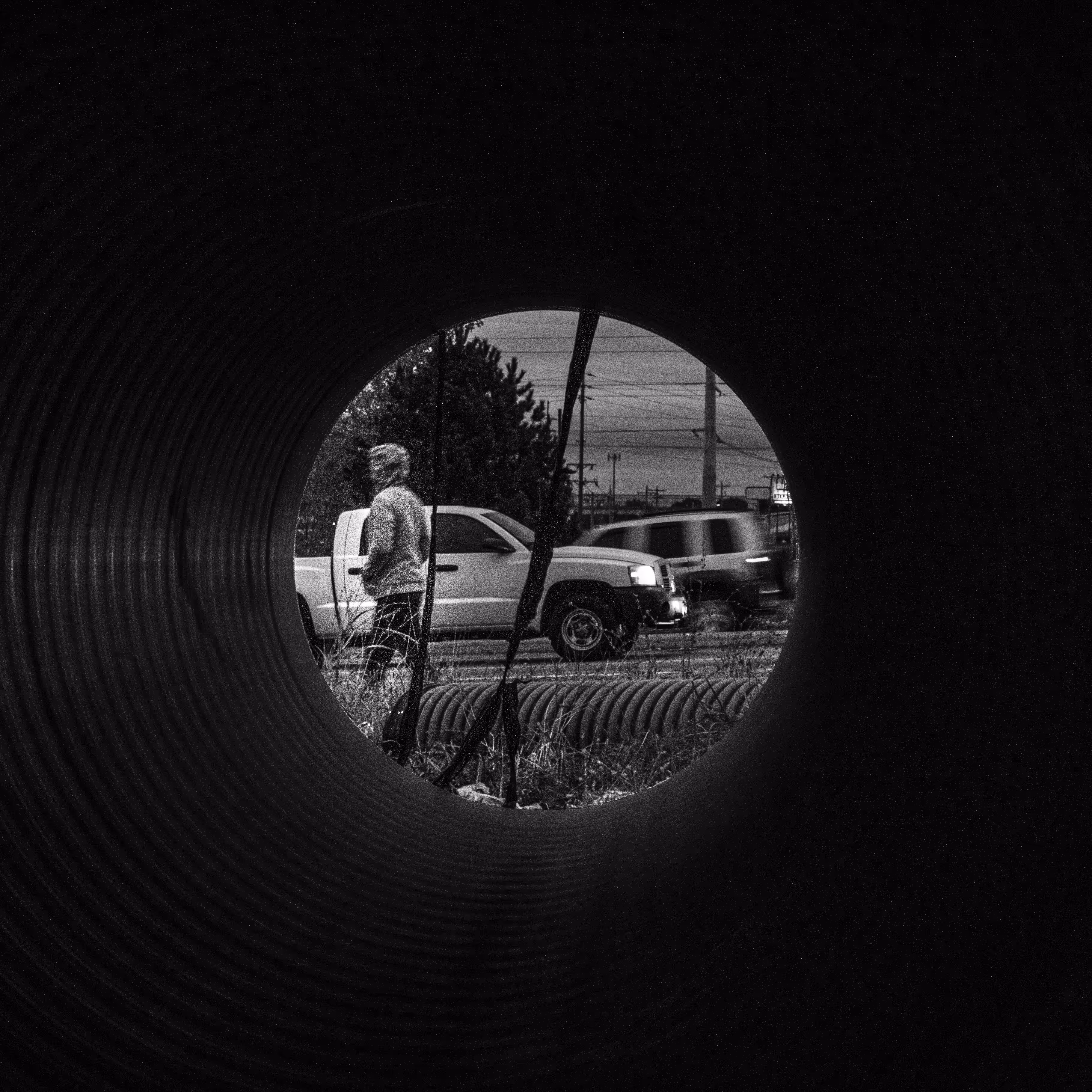 man through pipe