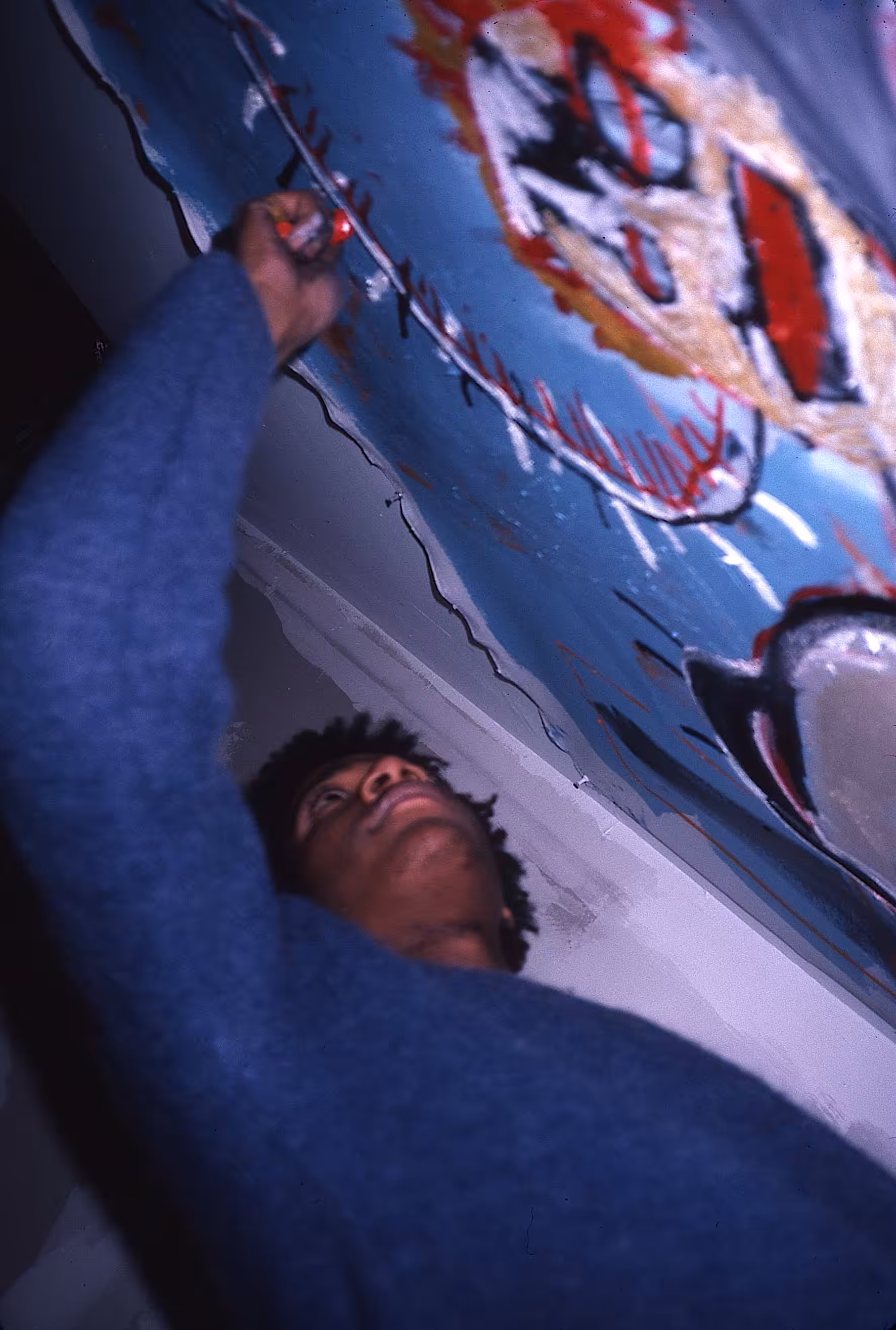 Jean Michel Basquiat in his first NY studio space, 1981.
