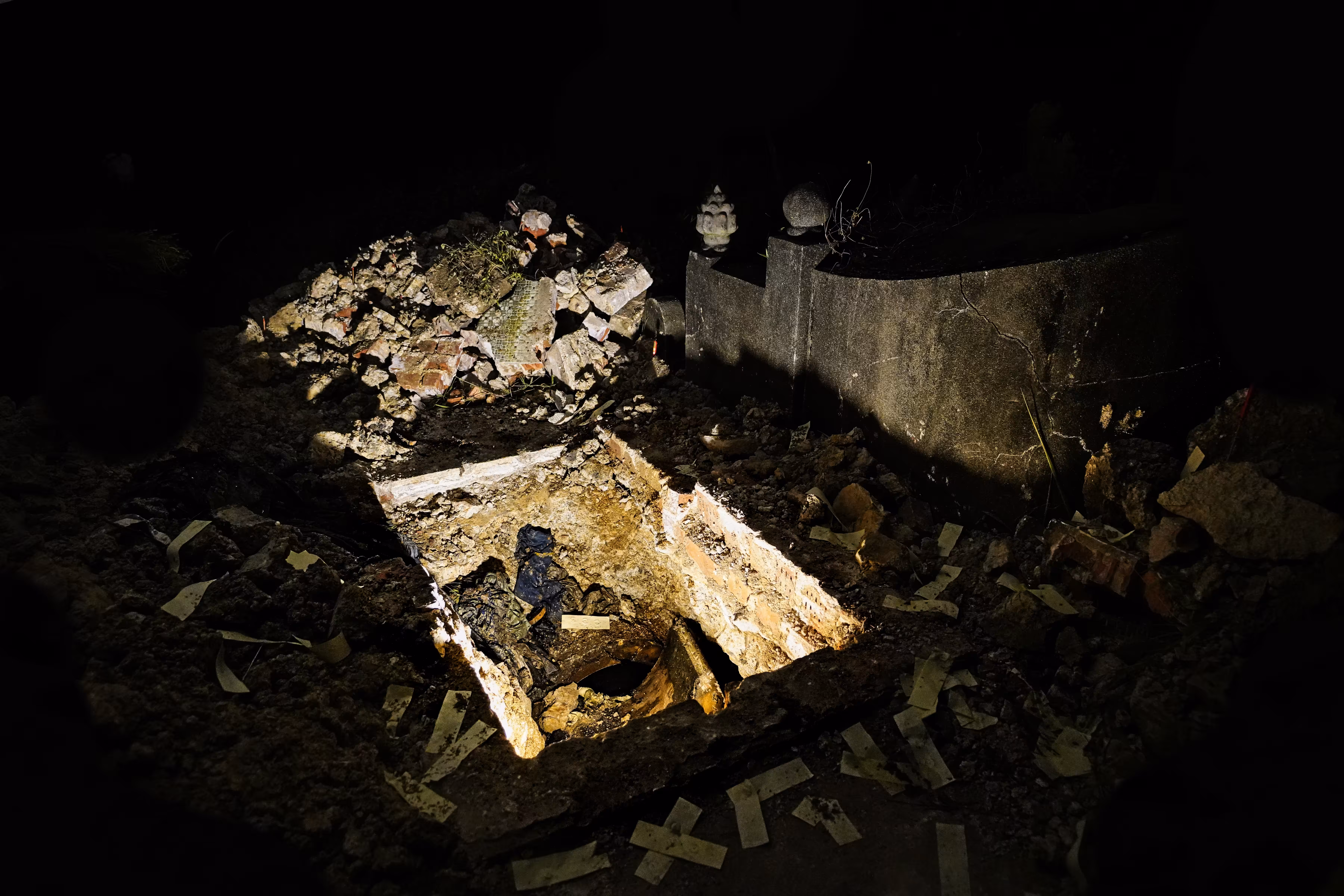 Night-time Cemetery Rituals, Singapore (5) - Partially exhumed grave, corpse still inside