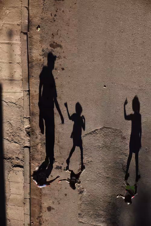 Shadows greet each other, there is something alive in them.