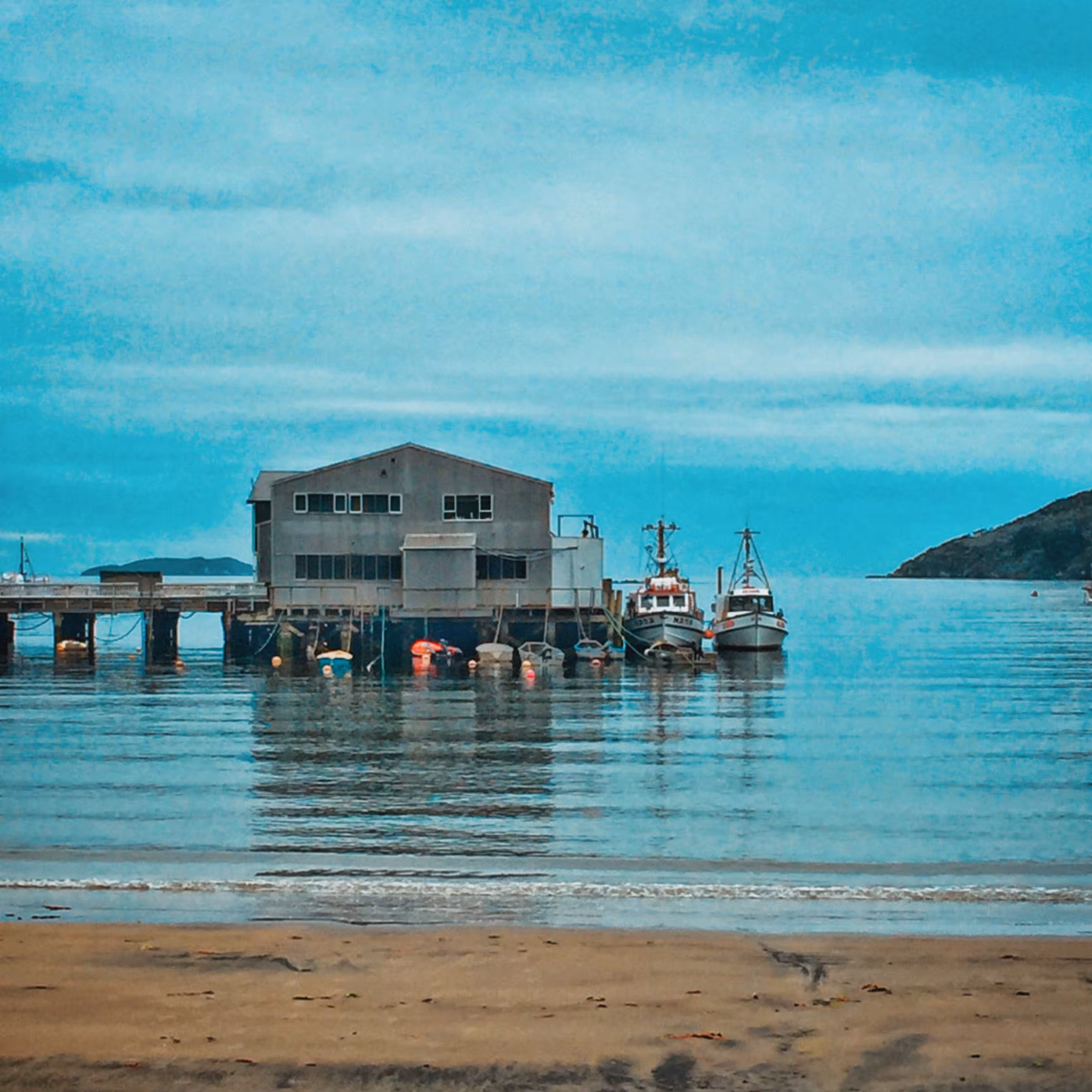 Calm Harbor Under a Blue Sky