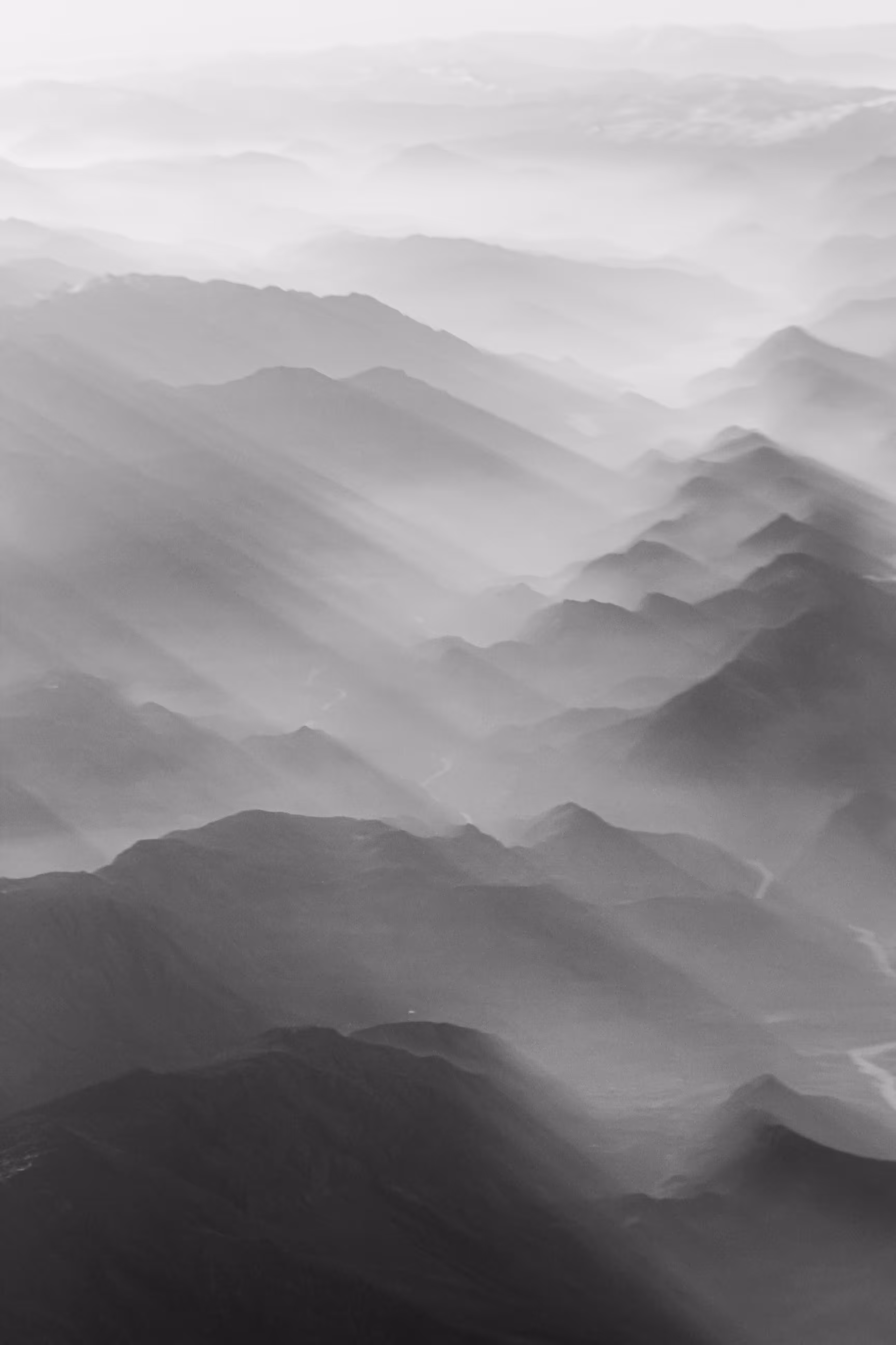 Mountain Peaks Bathed in Dawn's Embrace