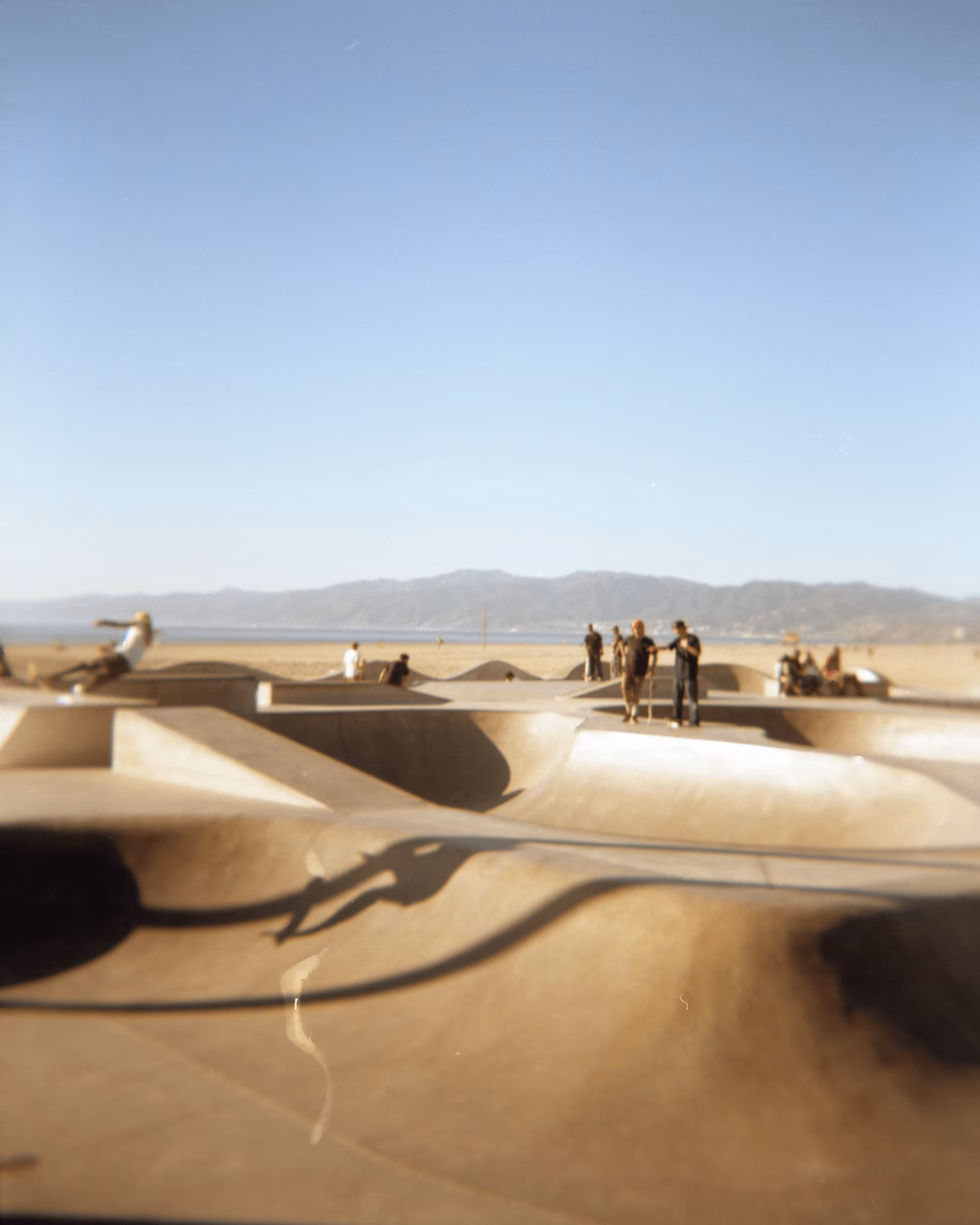 Shot on Holga #3: Skaters at the Beach