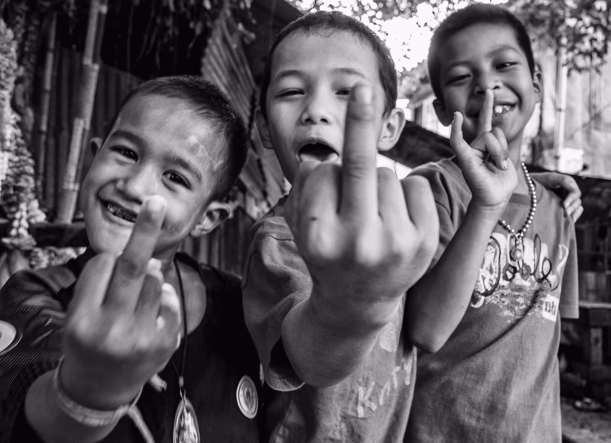 Faces of Khlongtoey - Black & White Street Portraits from a Bangkok You've Never Seen: Three-Finger Salute - FOK30