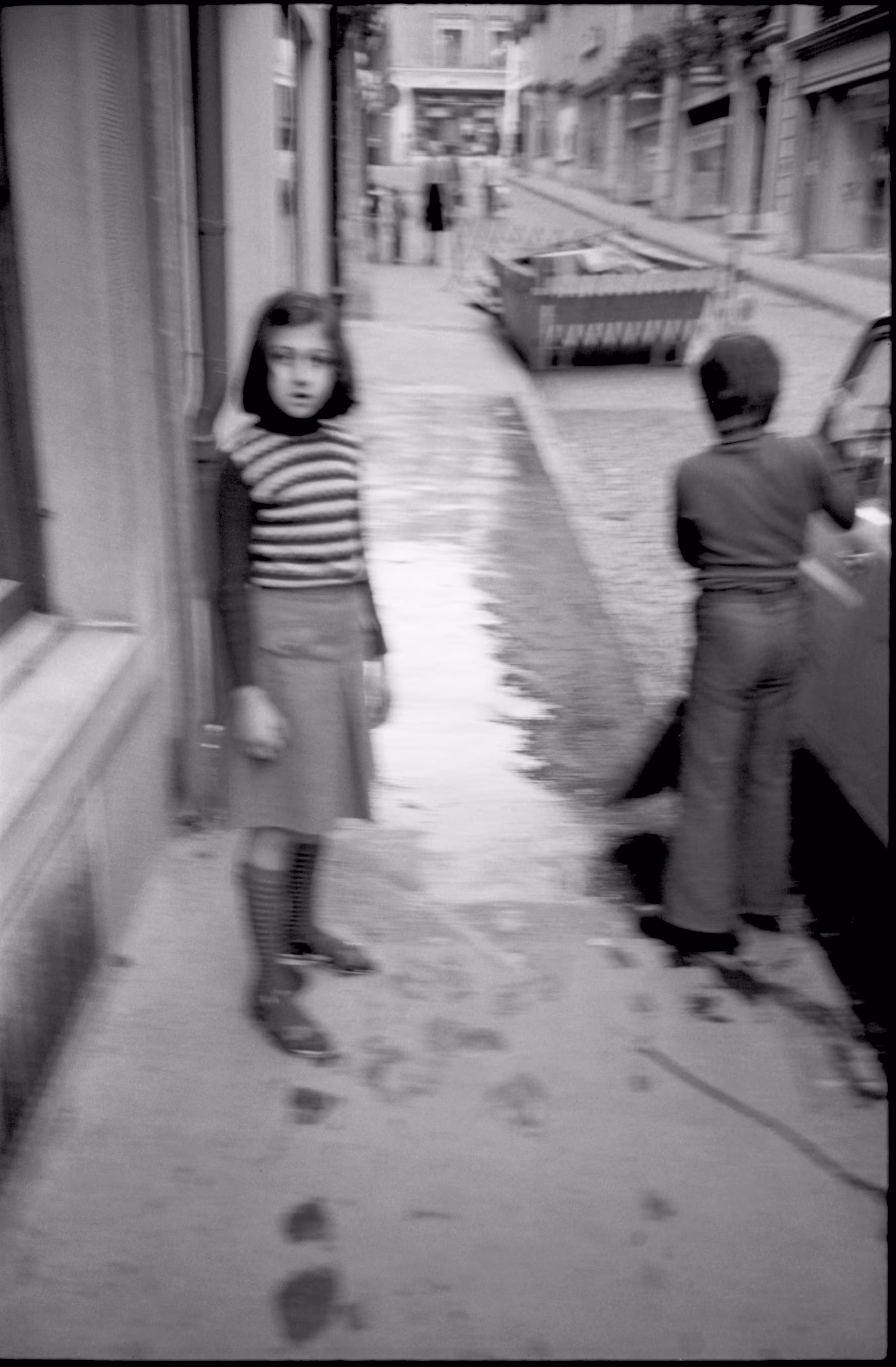 Particles and Waves: Children Playing on a Sidewalk