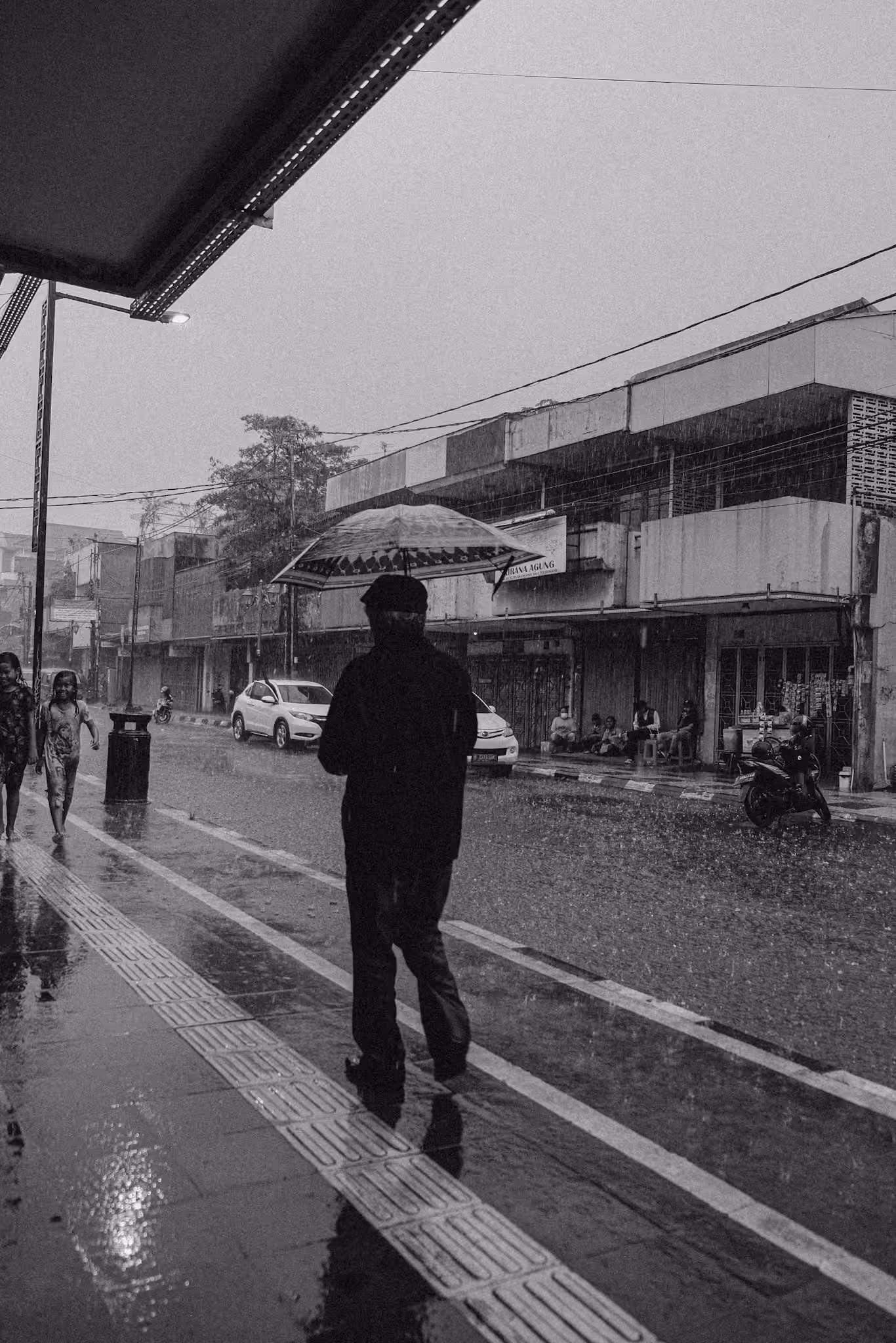 Walk alone in the morning rain