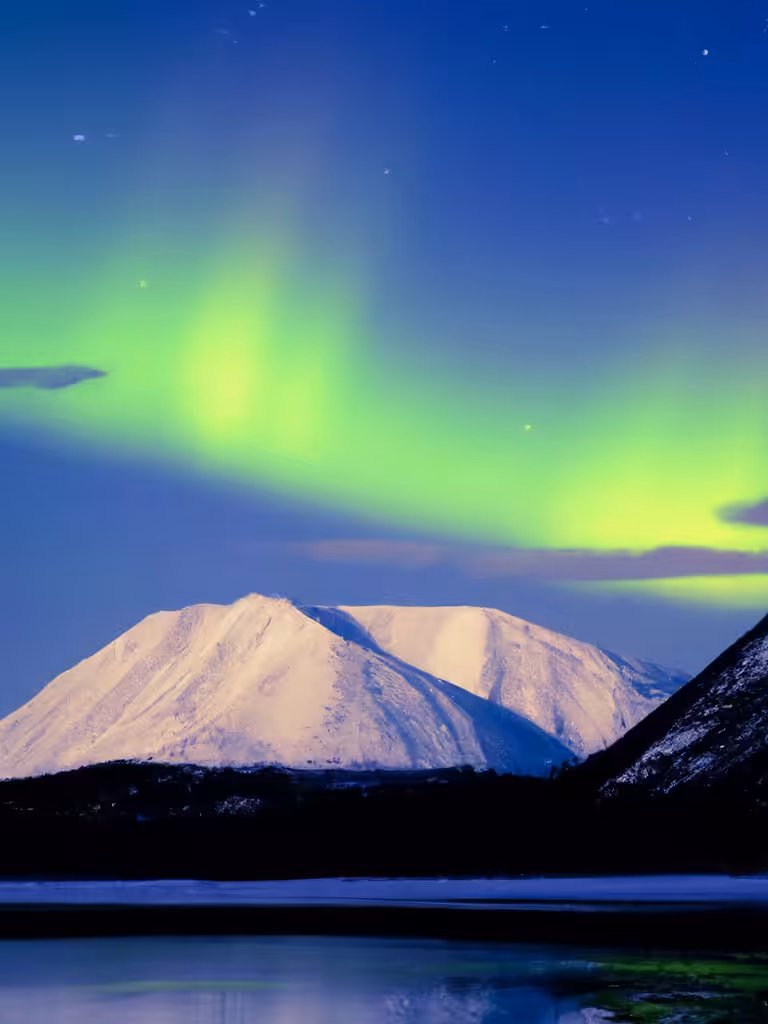 Northern Lights Over Snow Capped Mountain Lake - Fourth Take