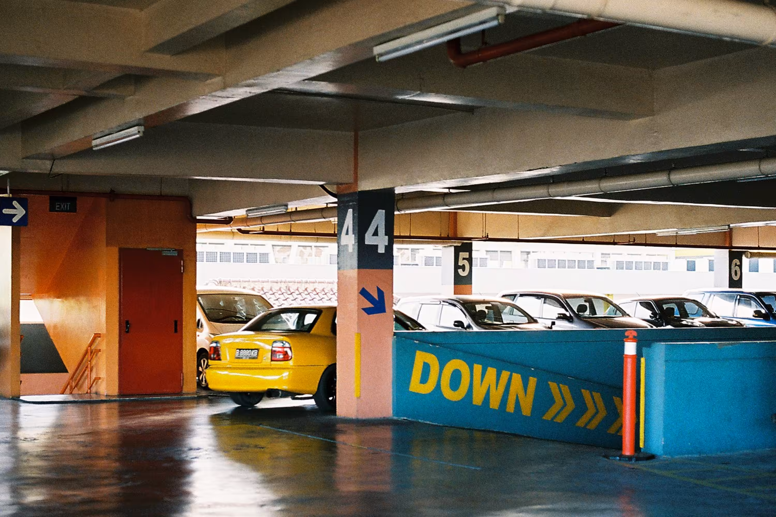 Yellow Car in a Parking Space