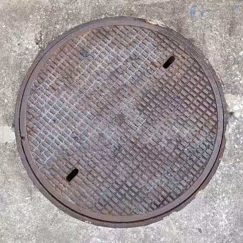$10,000 MANHOLE COVER
