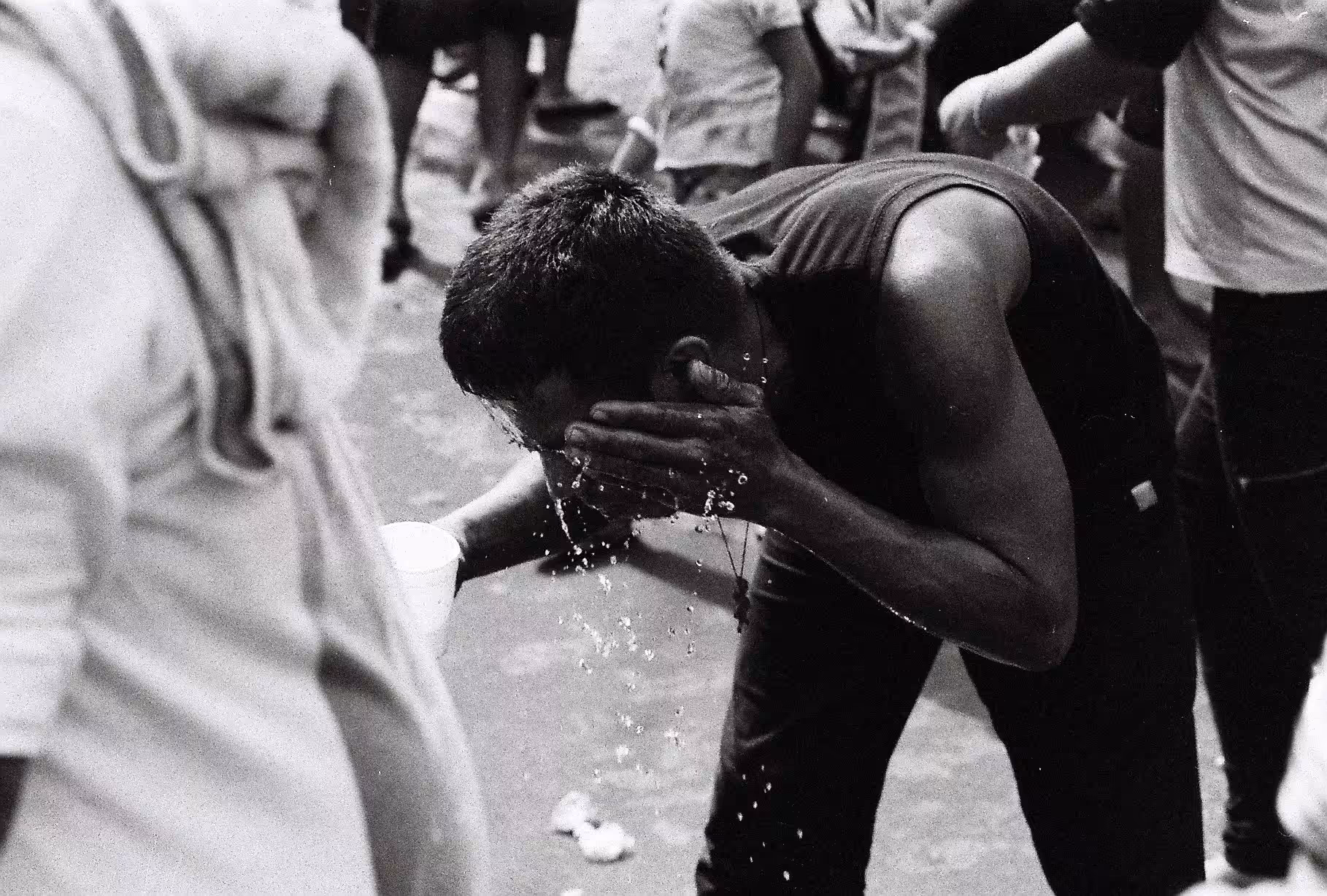 A Man Washing His Face