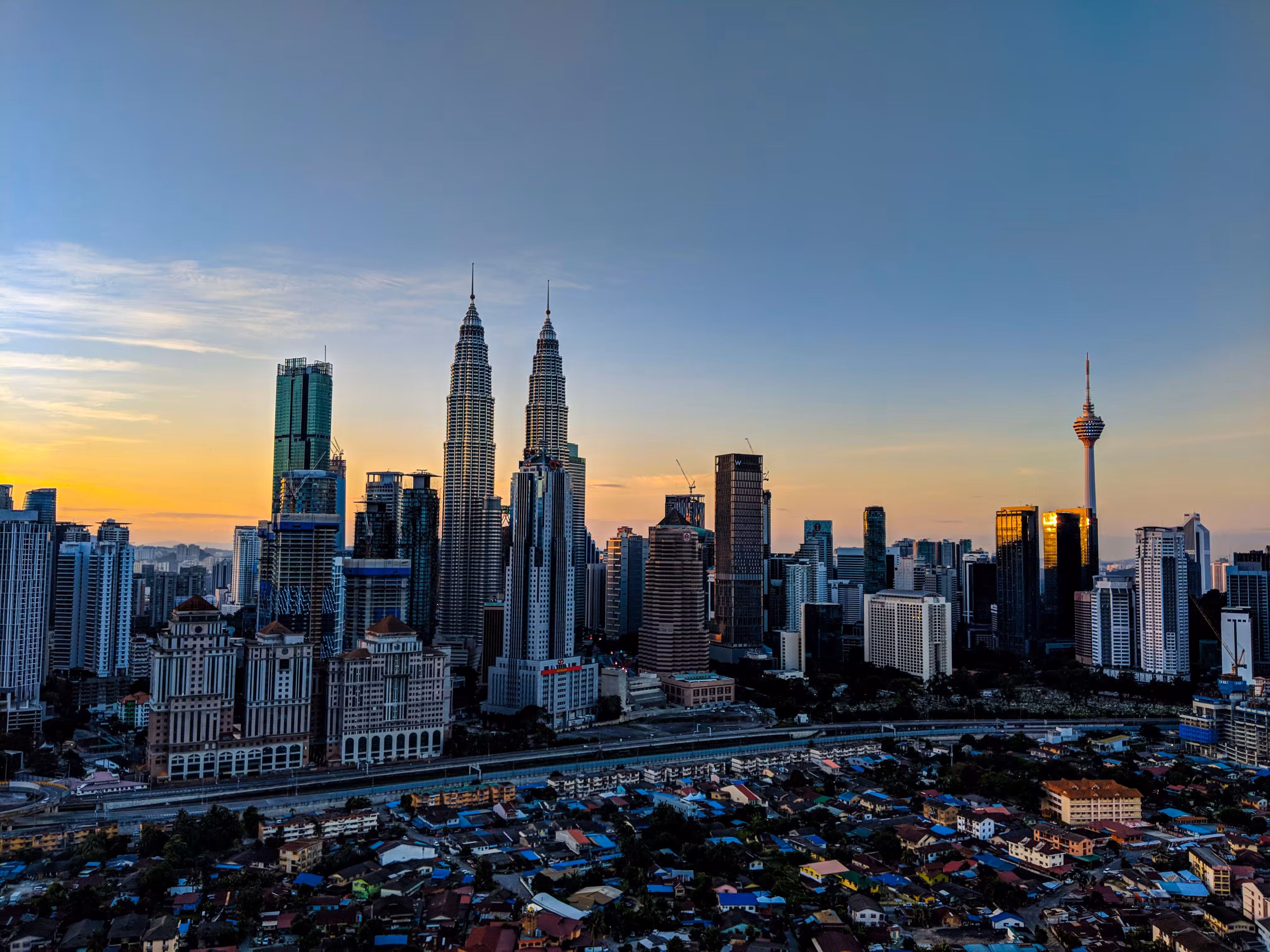"Golden Hour Over Kuala Lumpur: A City in Transition"