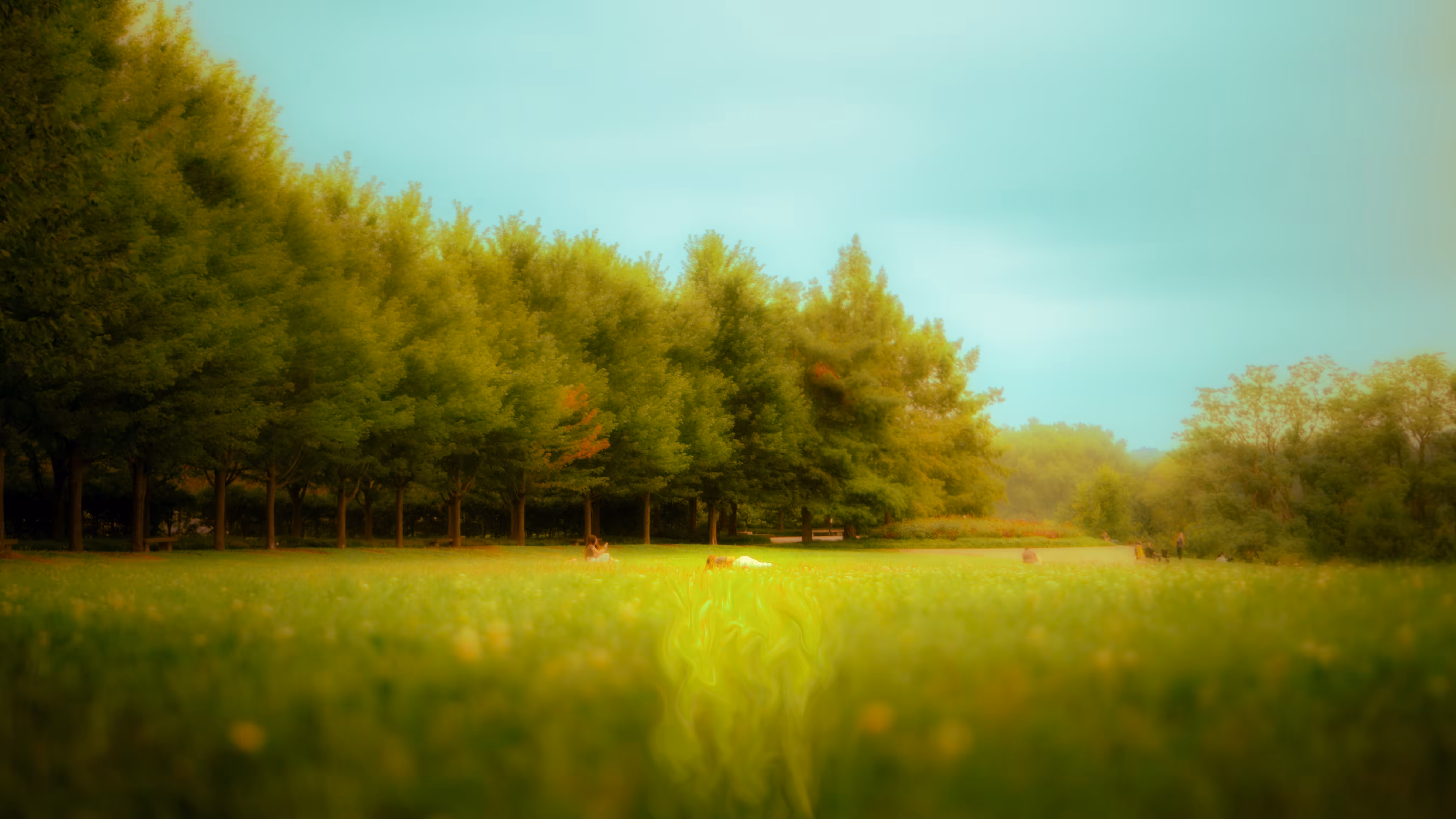 sleeping woman melts into grass