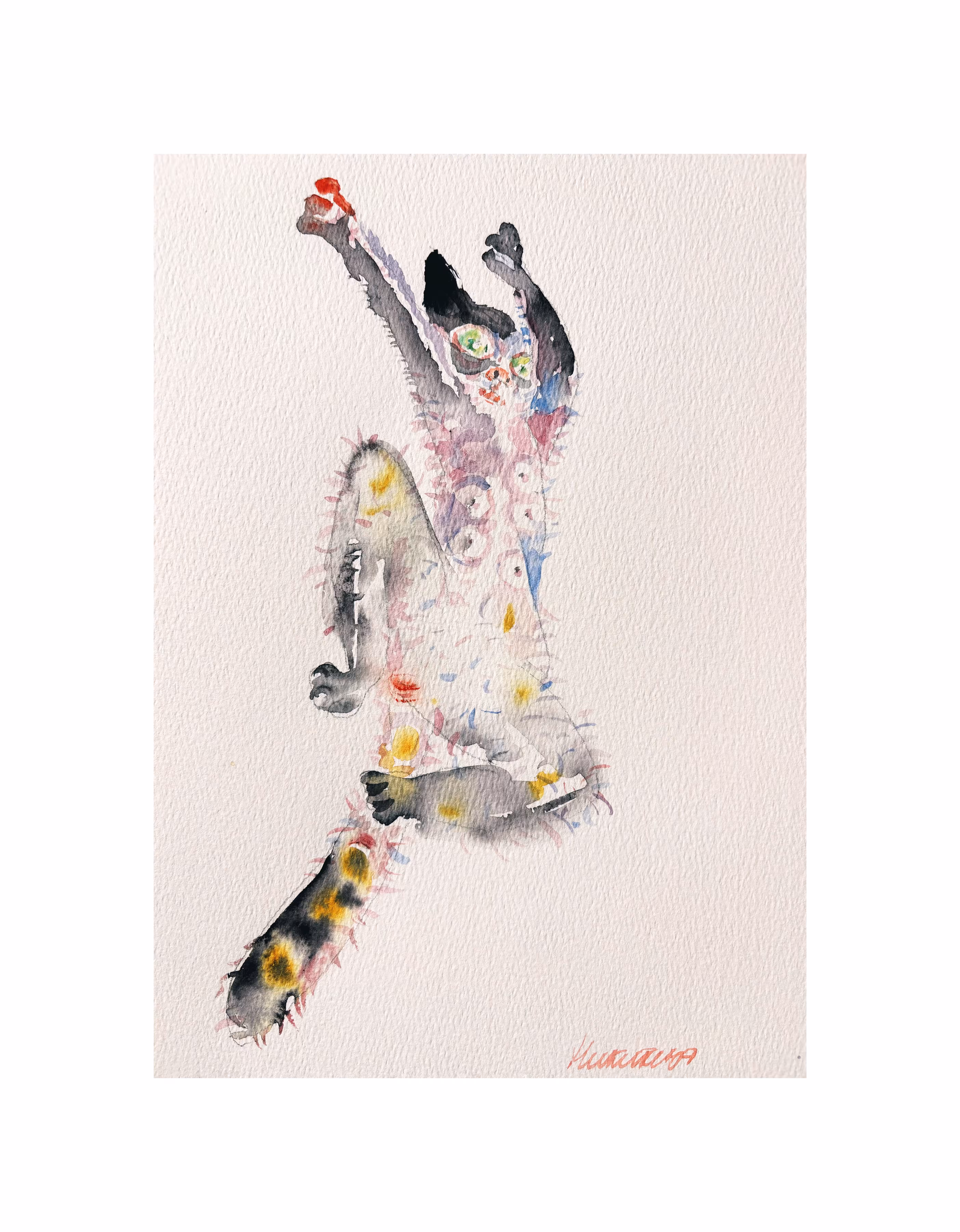 A tricolor cat in the act of delivering a devastating blow