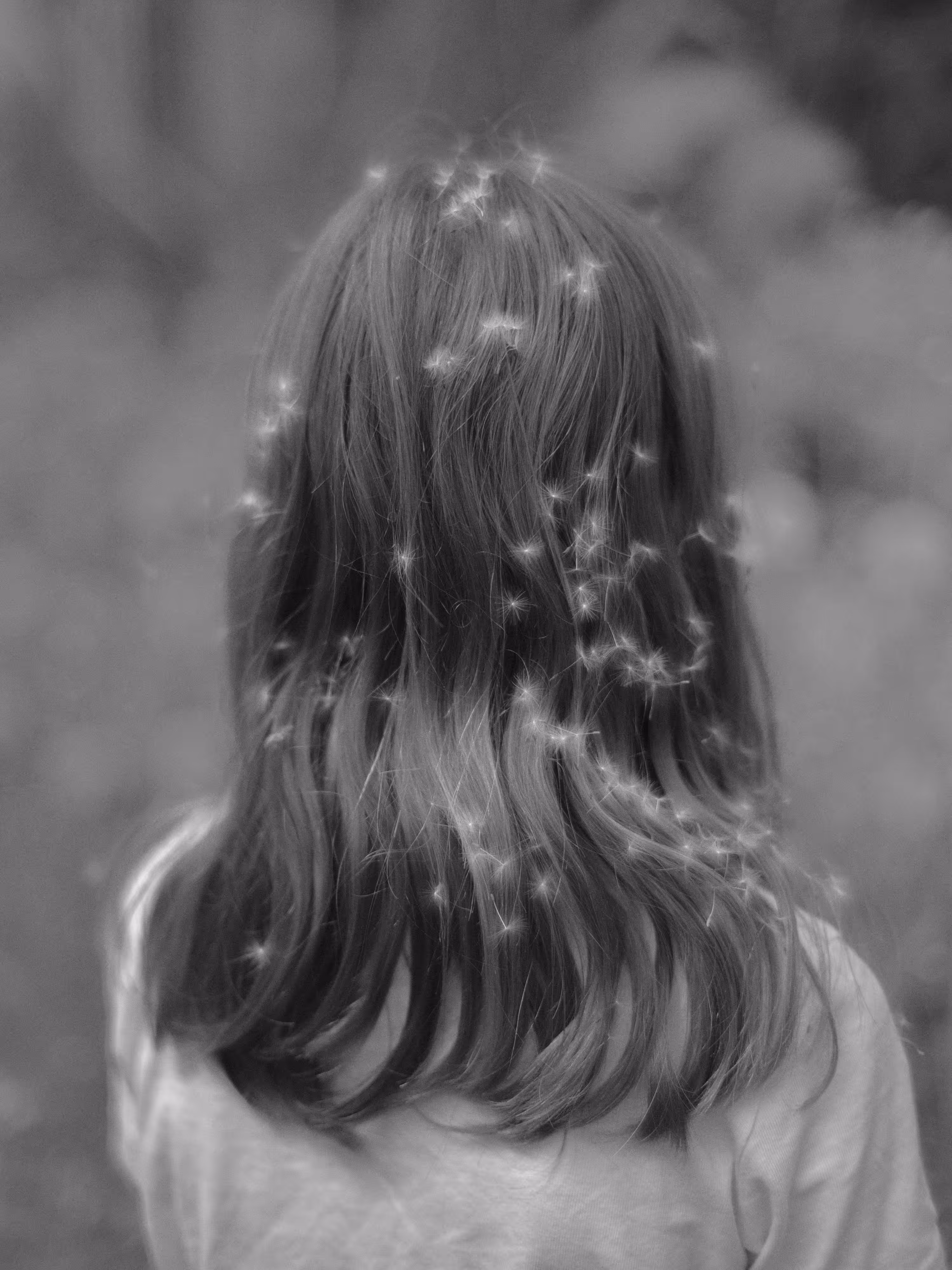 Ronja with dandelions on her hair
