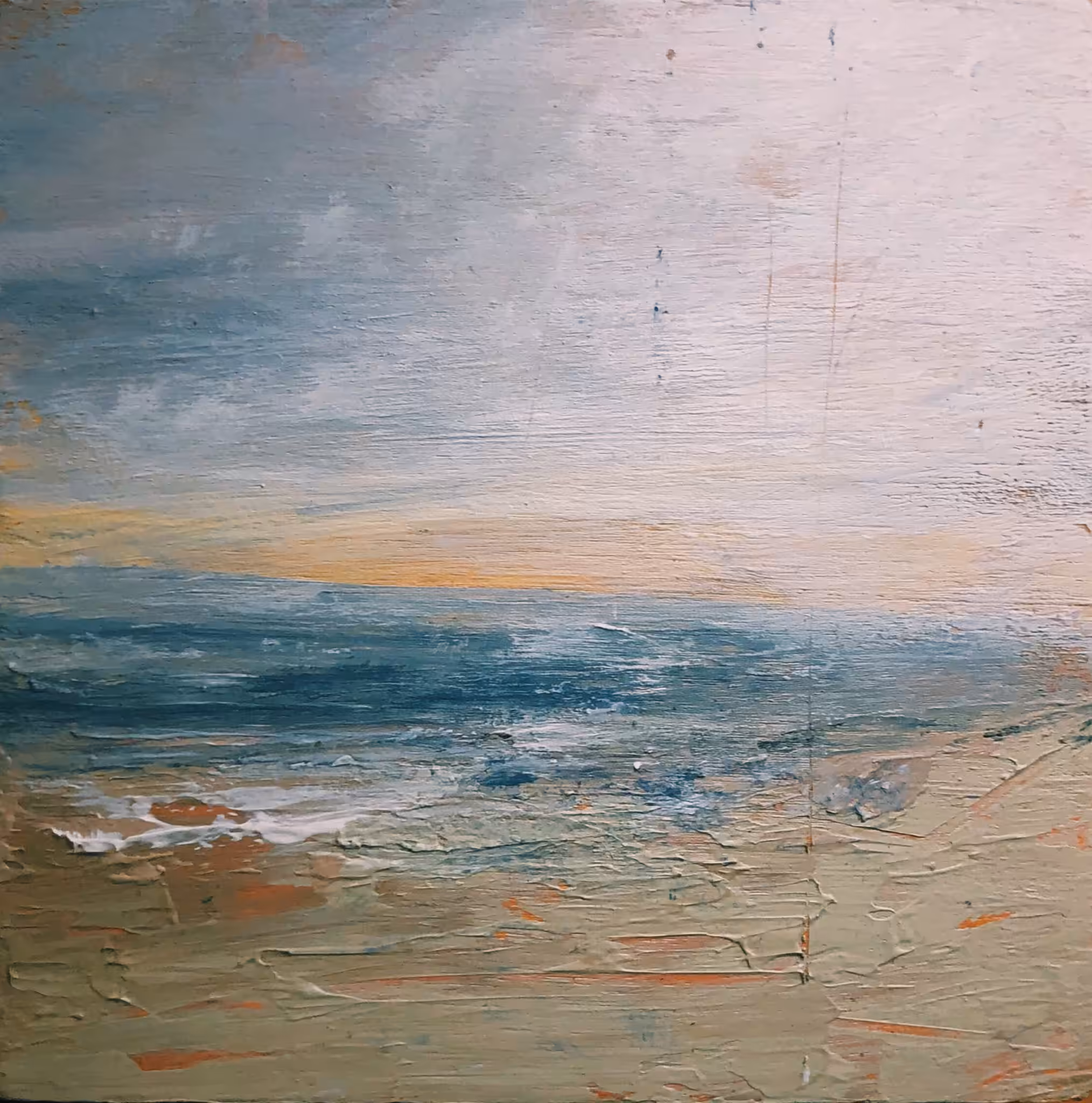 The calm sea greets the coast regularly