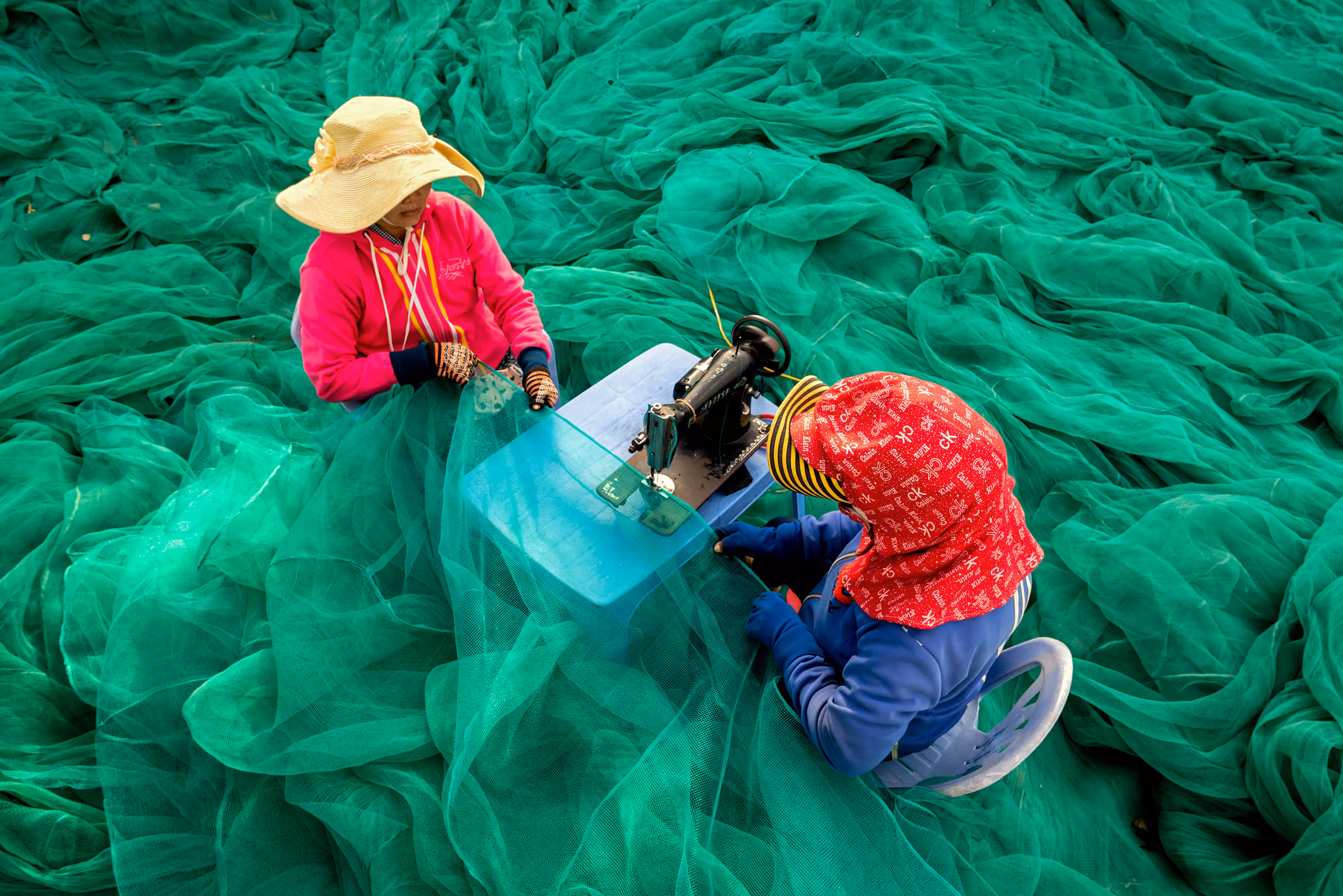 Sewing the fishing nets