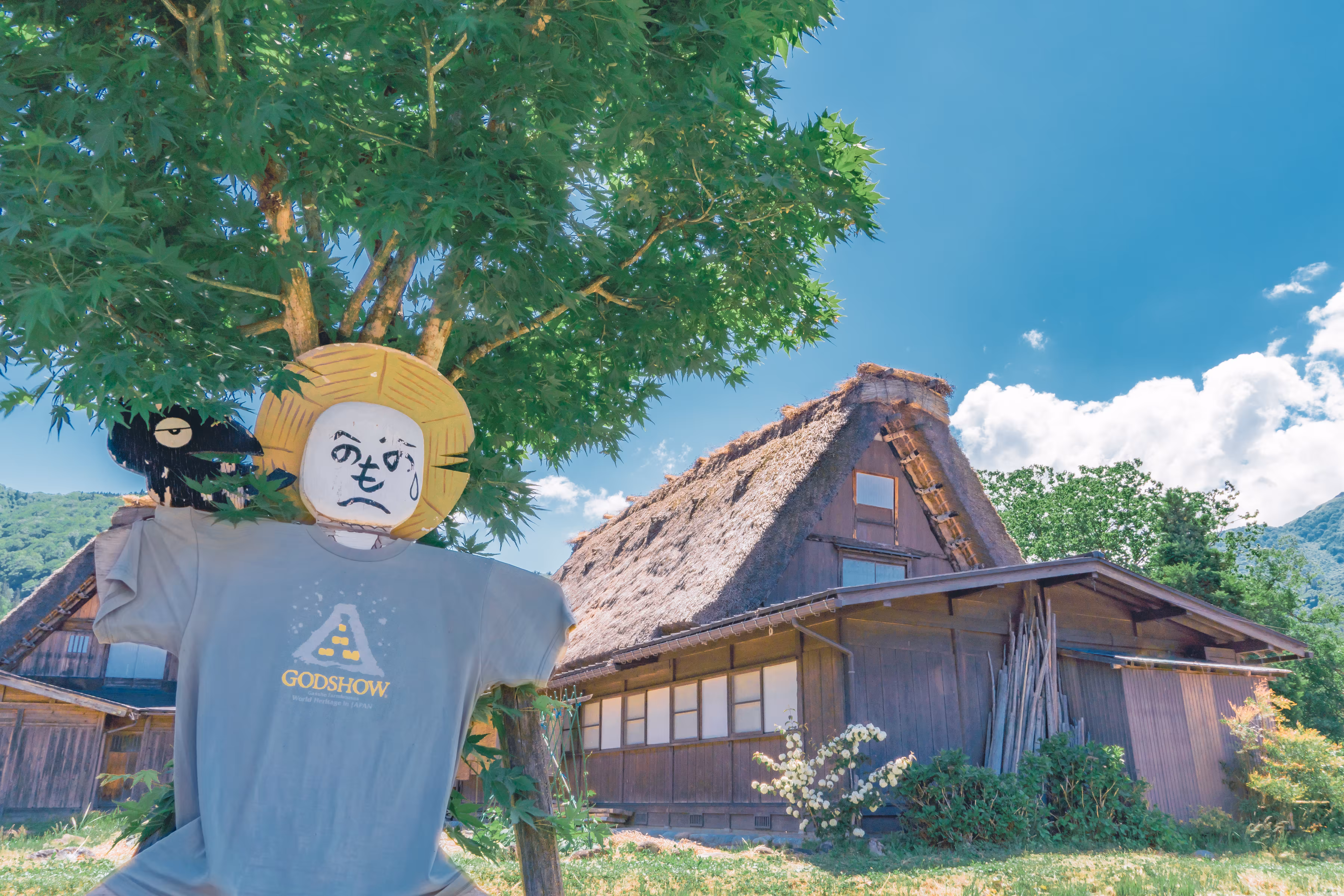 A village watched over by scarecrows
