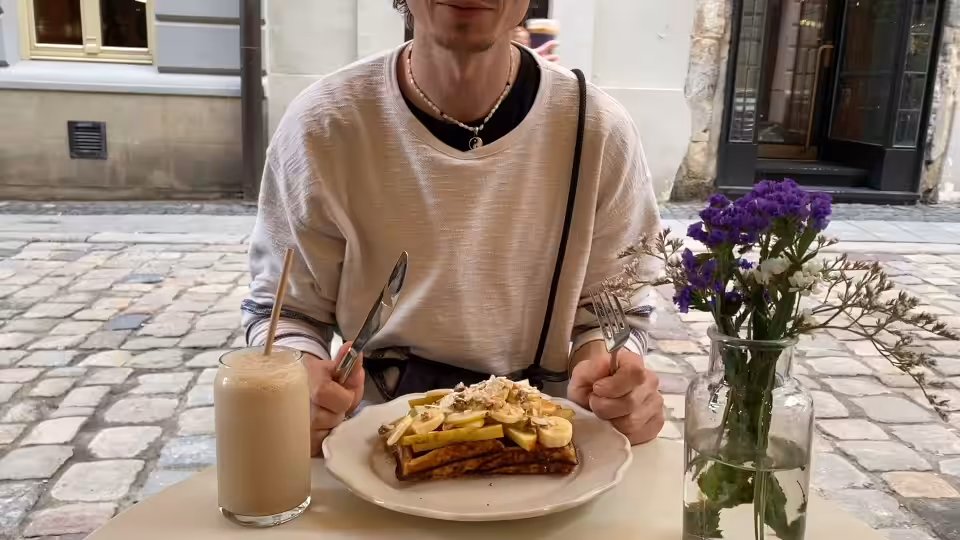 "Me eating waffles while a random fly crawling on the longsleeve"