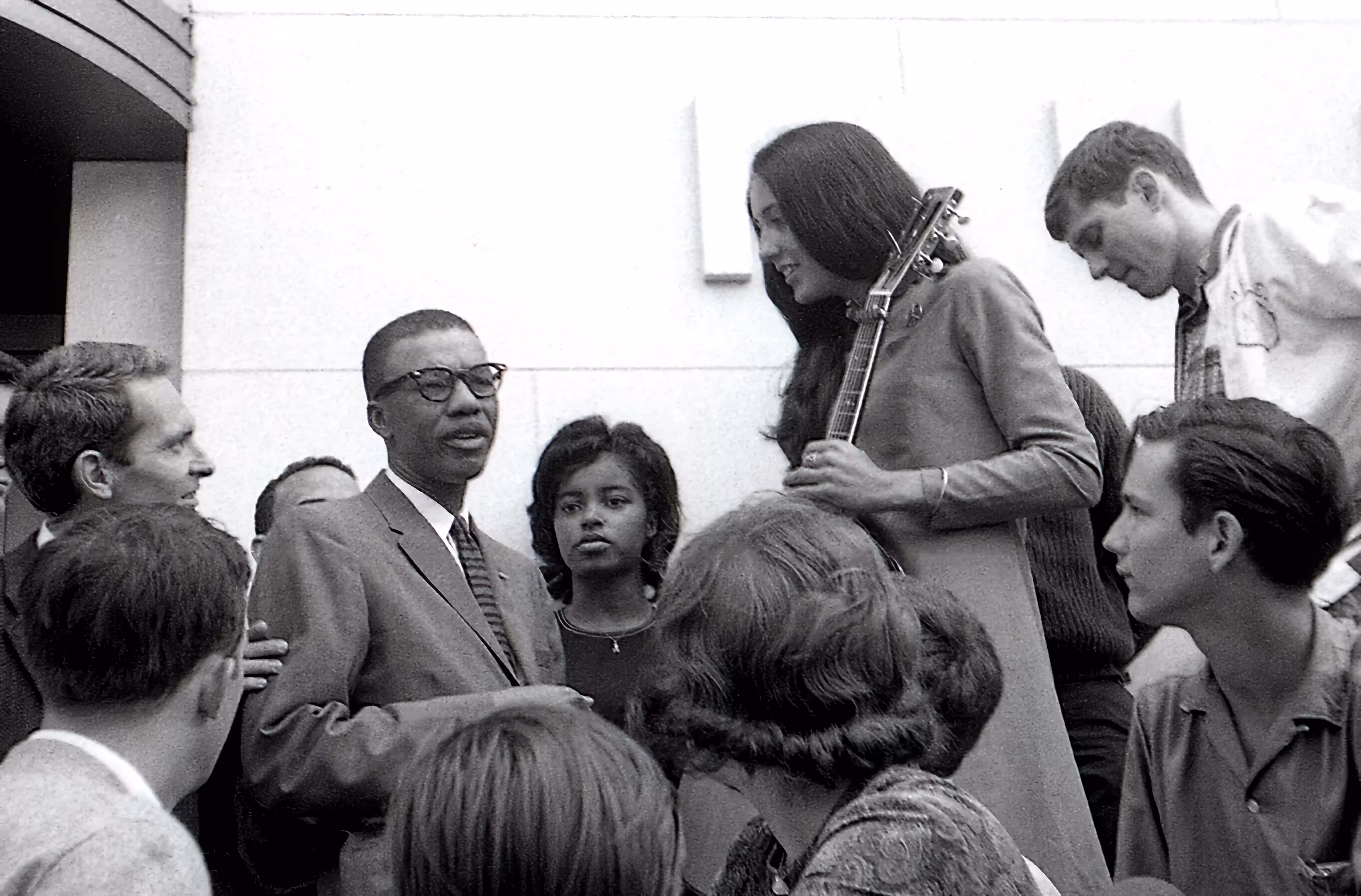 Joan Baez with Volma Overton, Sr., at a Civil Rights Demonstration - Austin, Texas Municipal Building, April, 1964