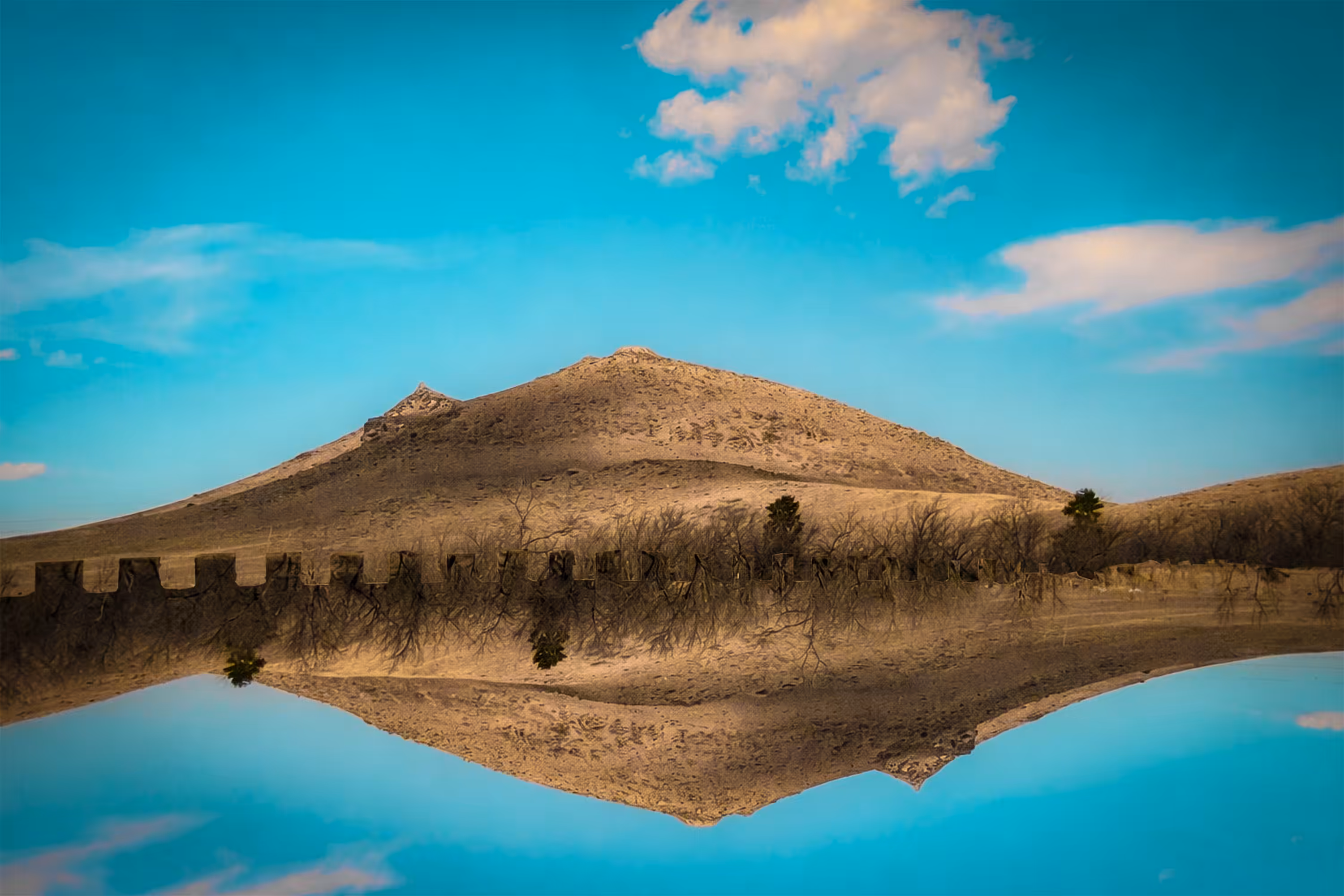 Echoes of Symmetry: Mountain to Infinite Sky