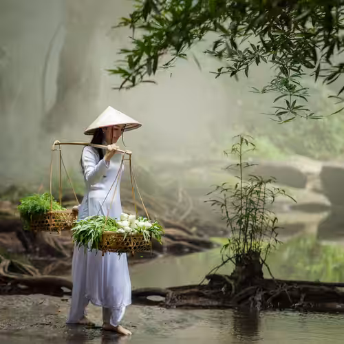 Beautiful woman wearing an Ao Dai #1