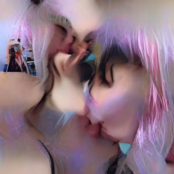 Manic pixie dream girl kissing girlfriend taking selfie