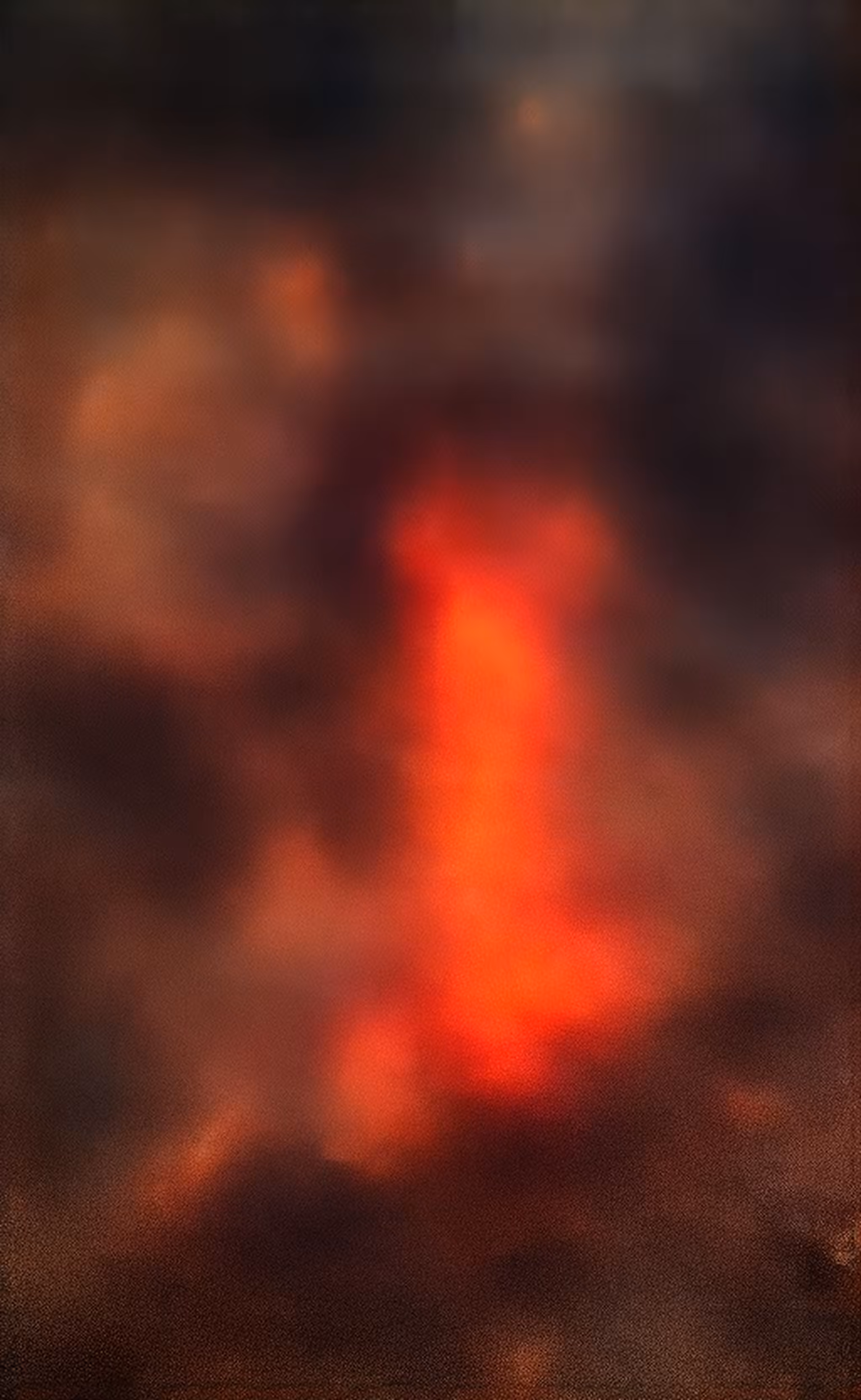 Huddled over a Fire