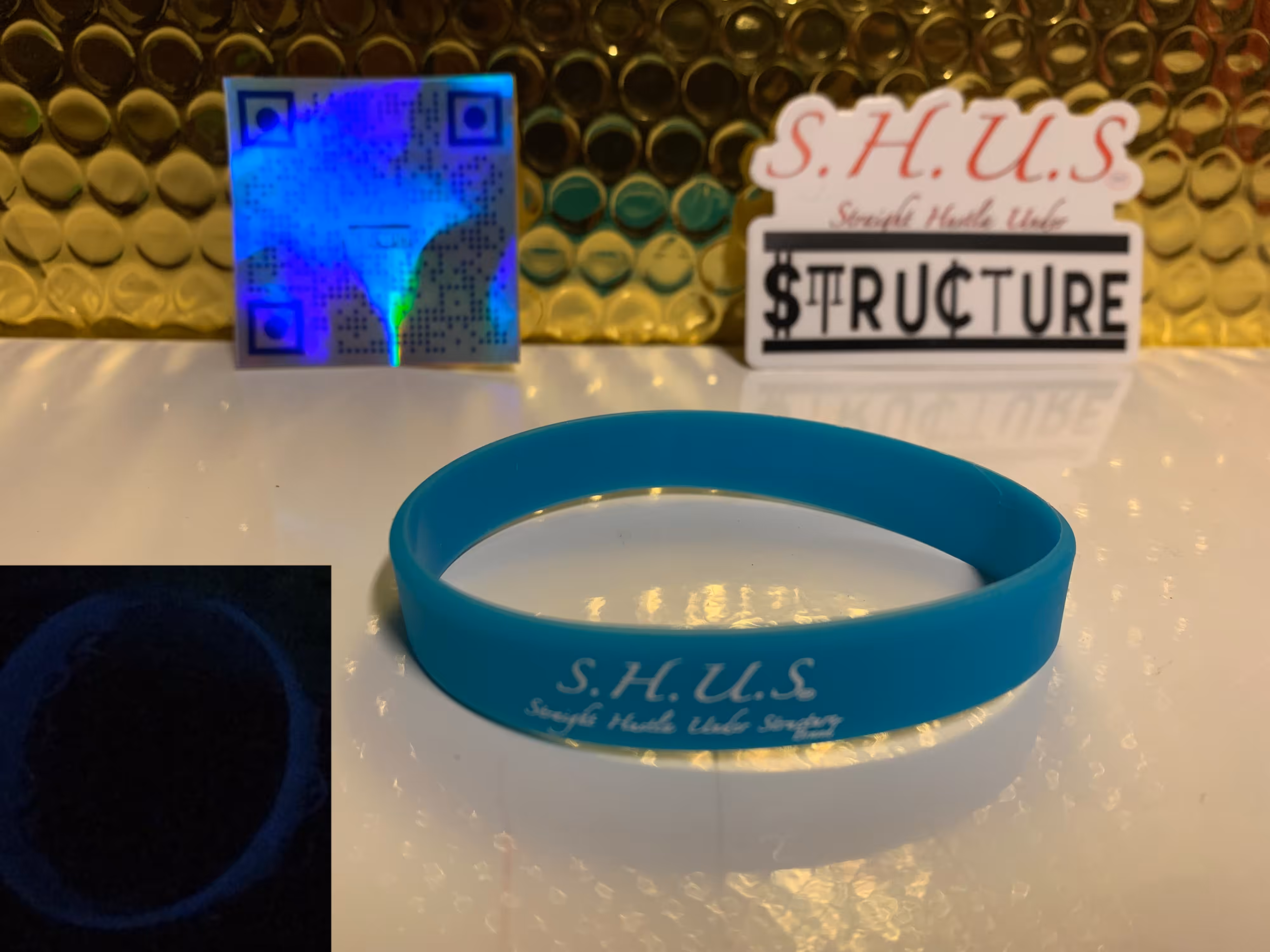 SHUS Brand Glow in dark blue wrist band 