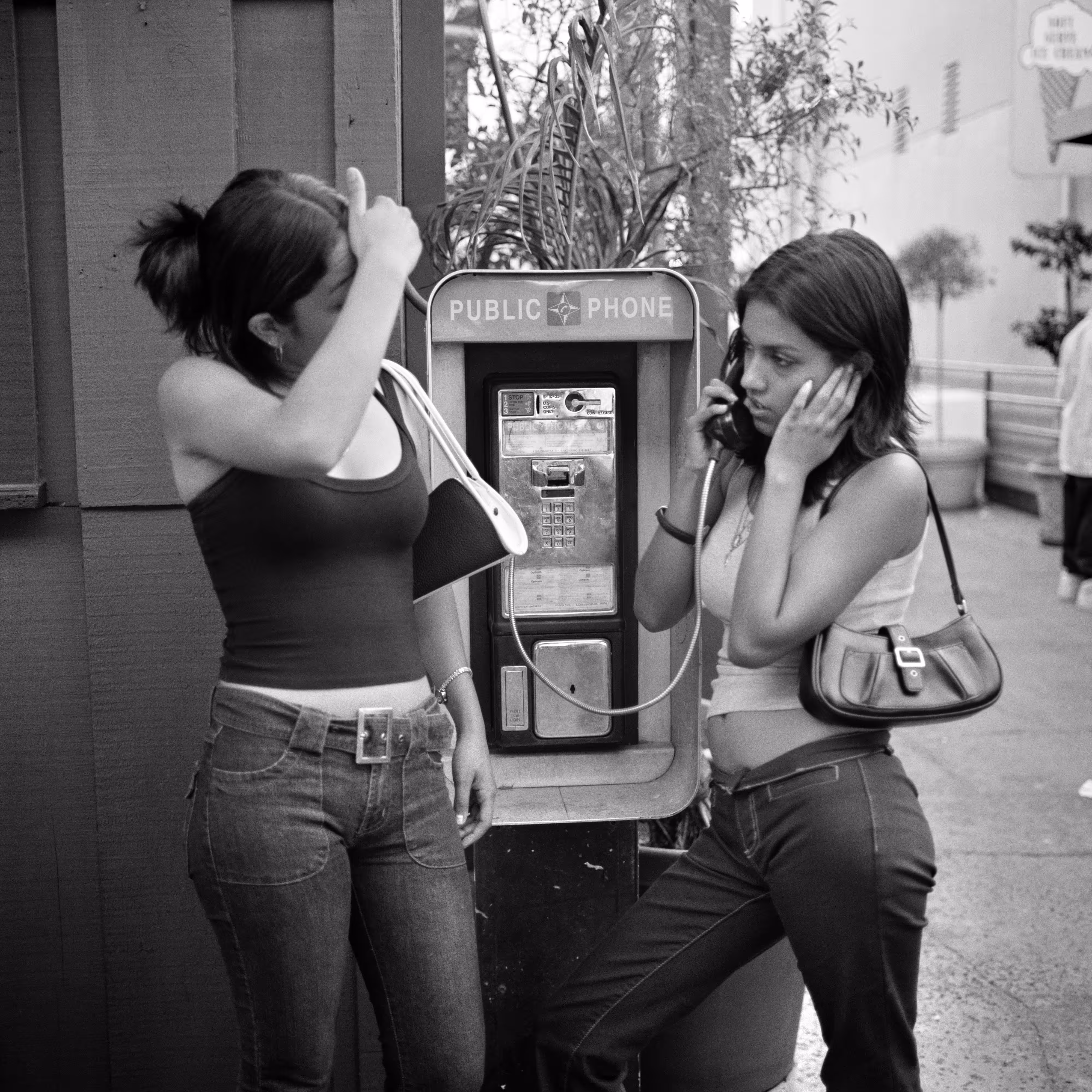 THE VILLAGE #29 TEEN GIRLS ON A PAYPHONE by Deanna Templeton