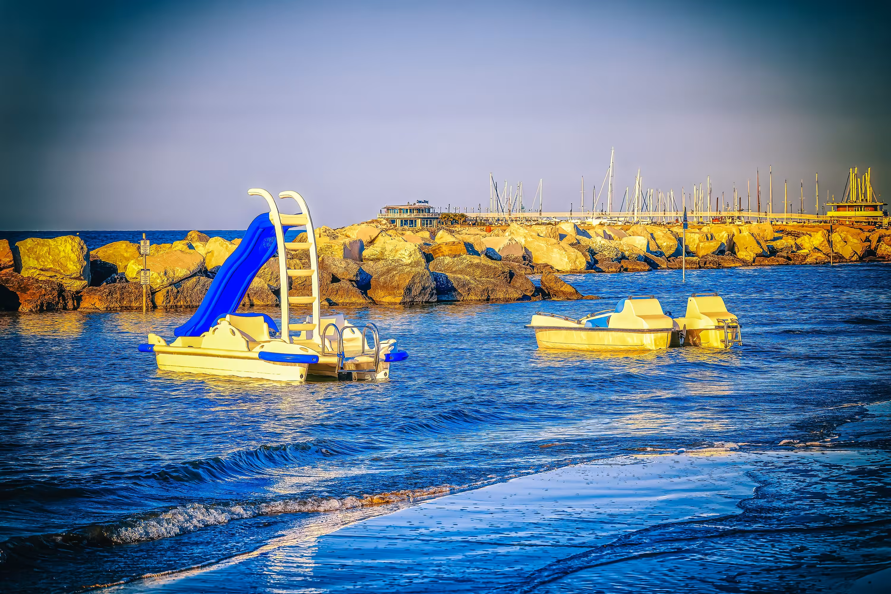 Seaside Photography – Pedal Boats at Golden Hour #BeachLife #Tourism