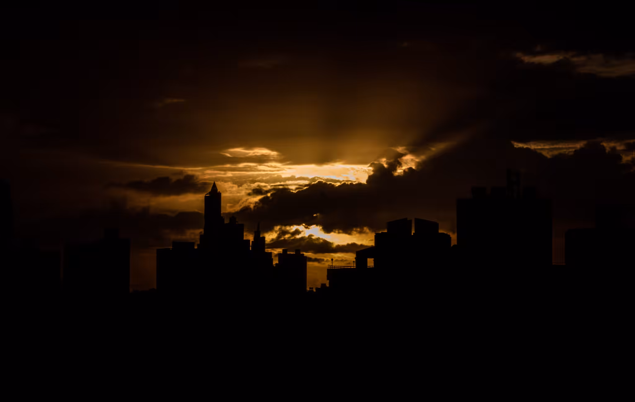 the sun hidden behind clouds.