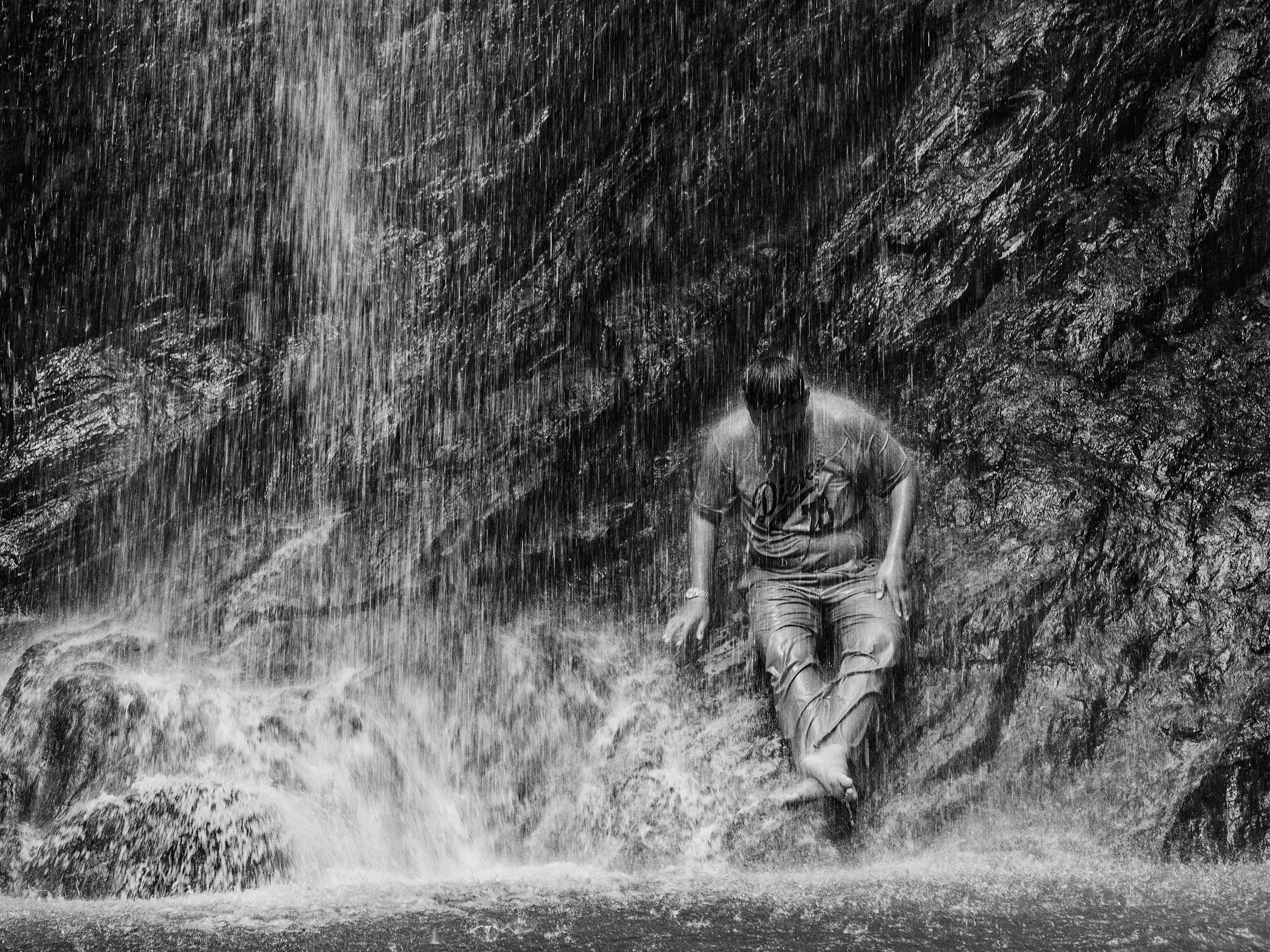 Under the waterfall