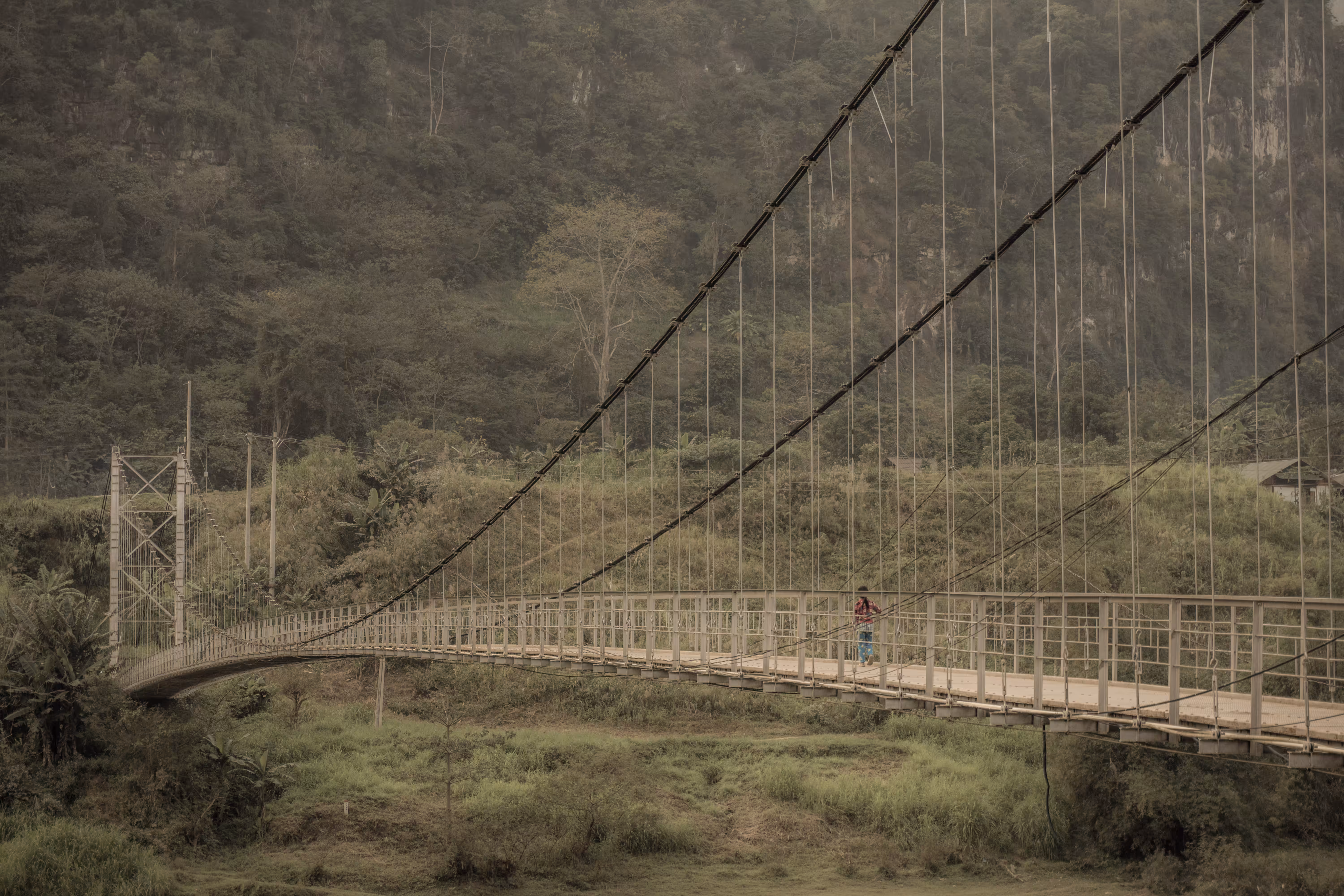 Child playing on the bridge