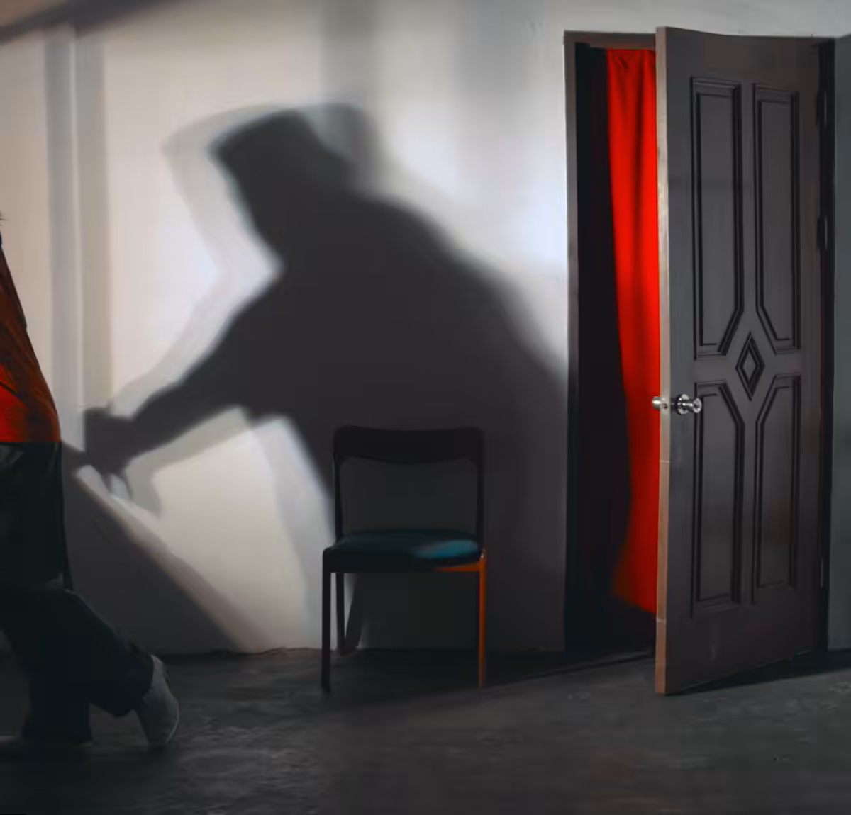Man Entering the Door