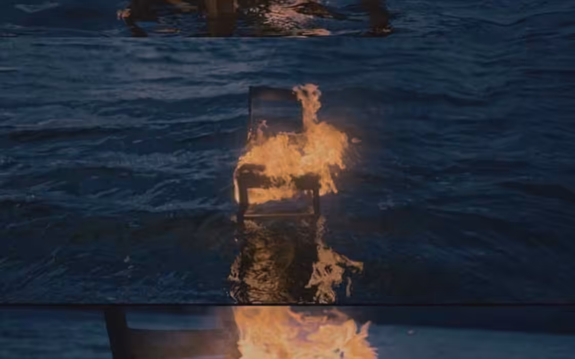 Chair Set Ablaze Encircled by Waves