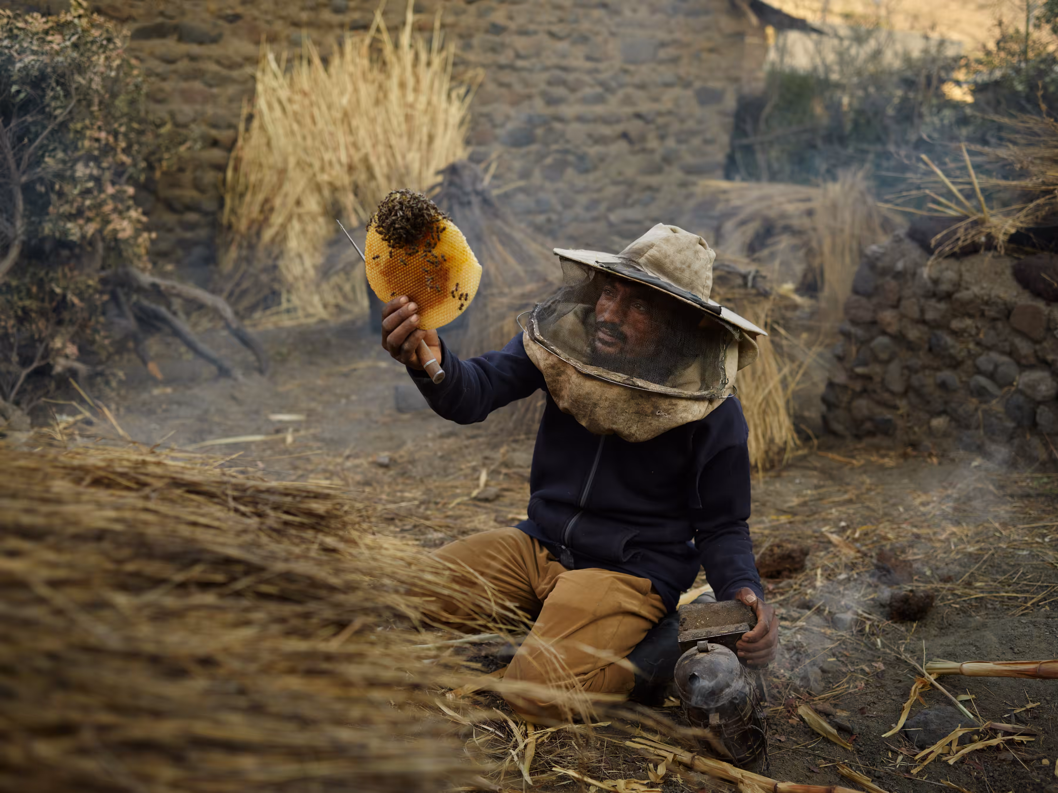 Ethiopia - Sisay Harvesting Honey in His Backyard