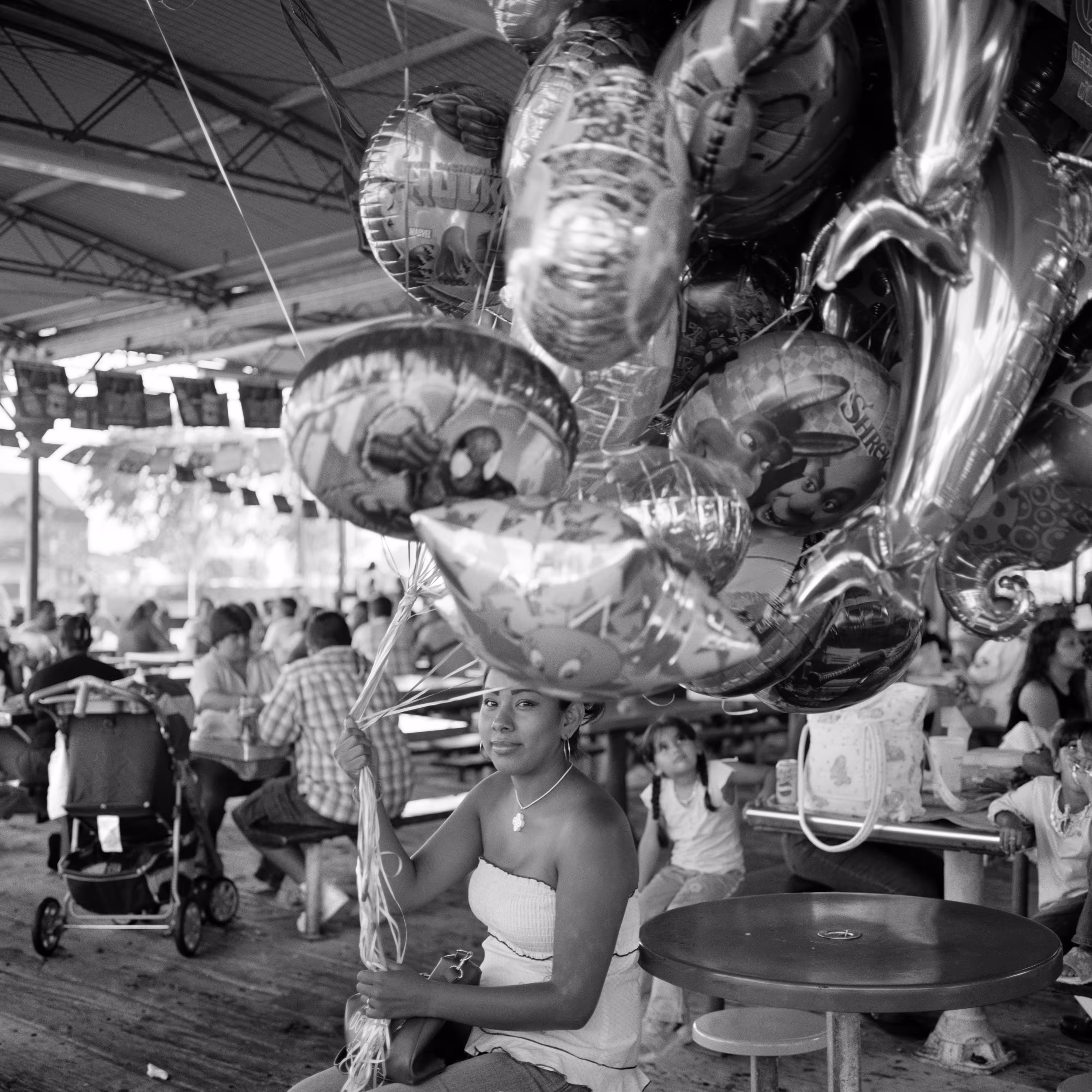 THE VILLAGE #46 YOUNG WOMAN SELLS BALLOONS by Deanna Templeton