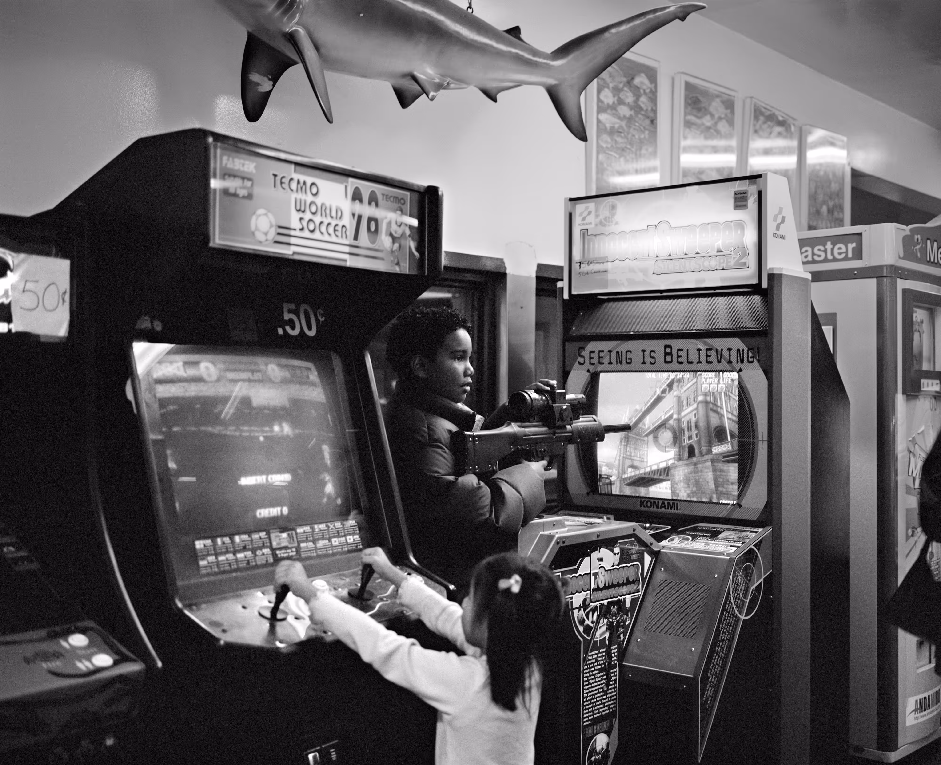 THE VILLAGE #13 TWO KIDS PLAY VIDEO GAMES by Deanna Templeton