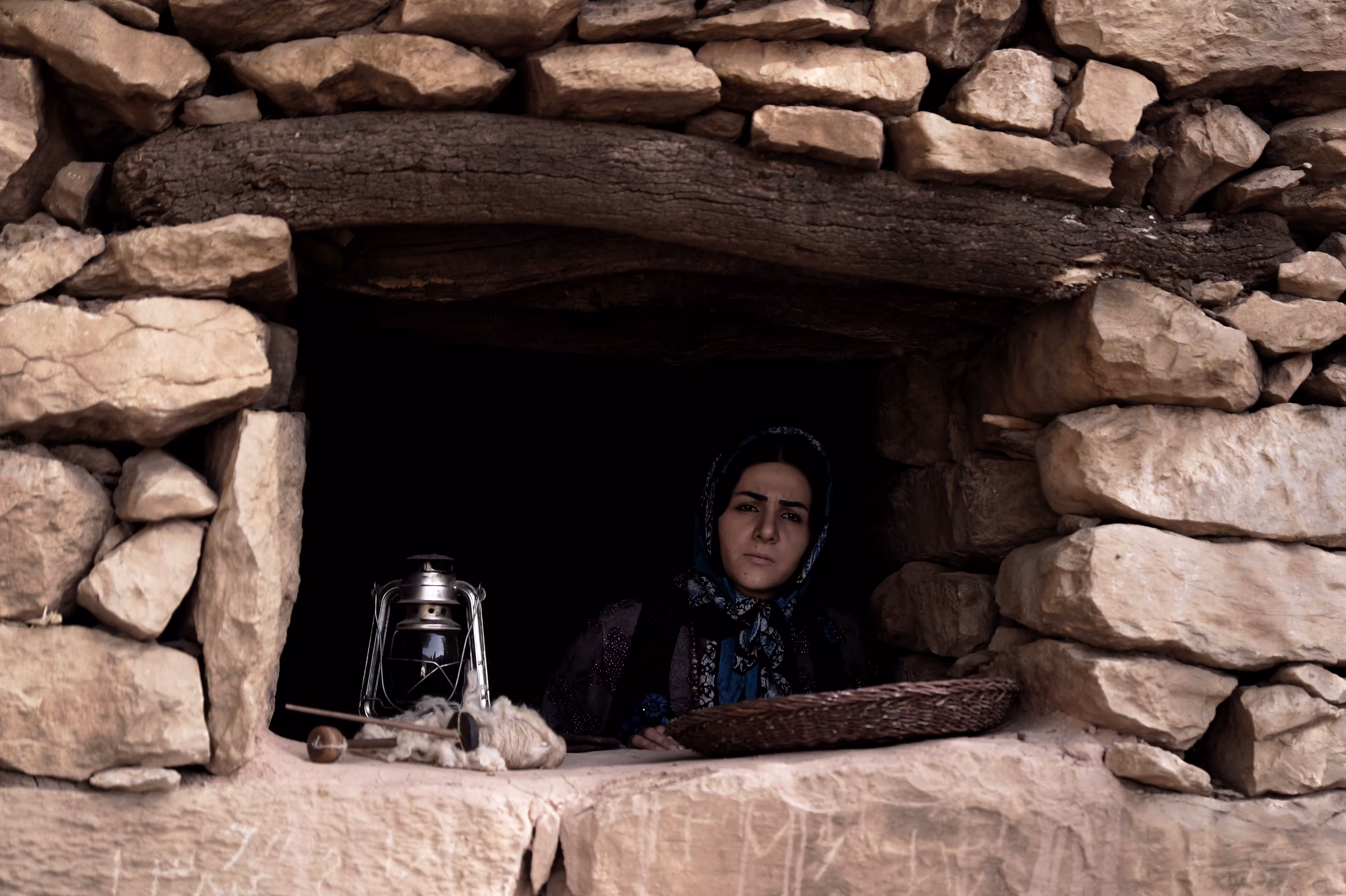 A woman in front of the window