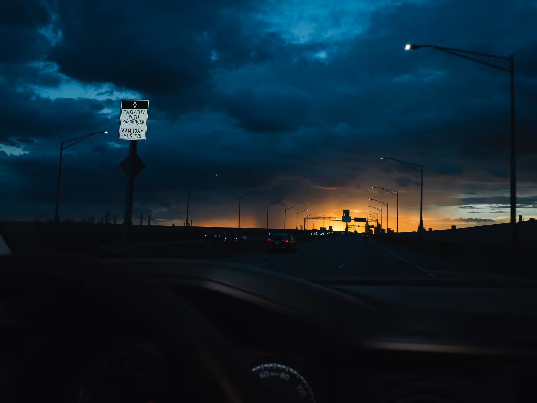 sunset driving into new york city 