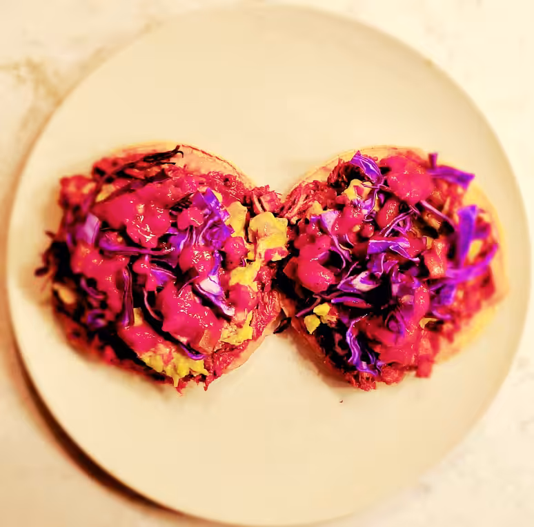 Leftover Chili Colorado tostadas with face melting Carolina Reaper sauce 