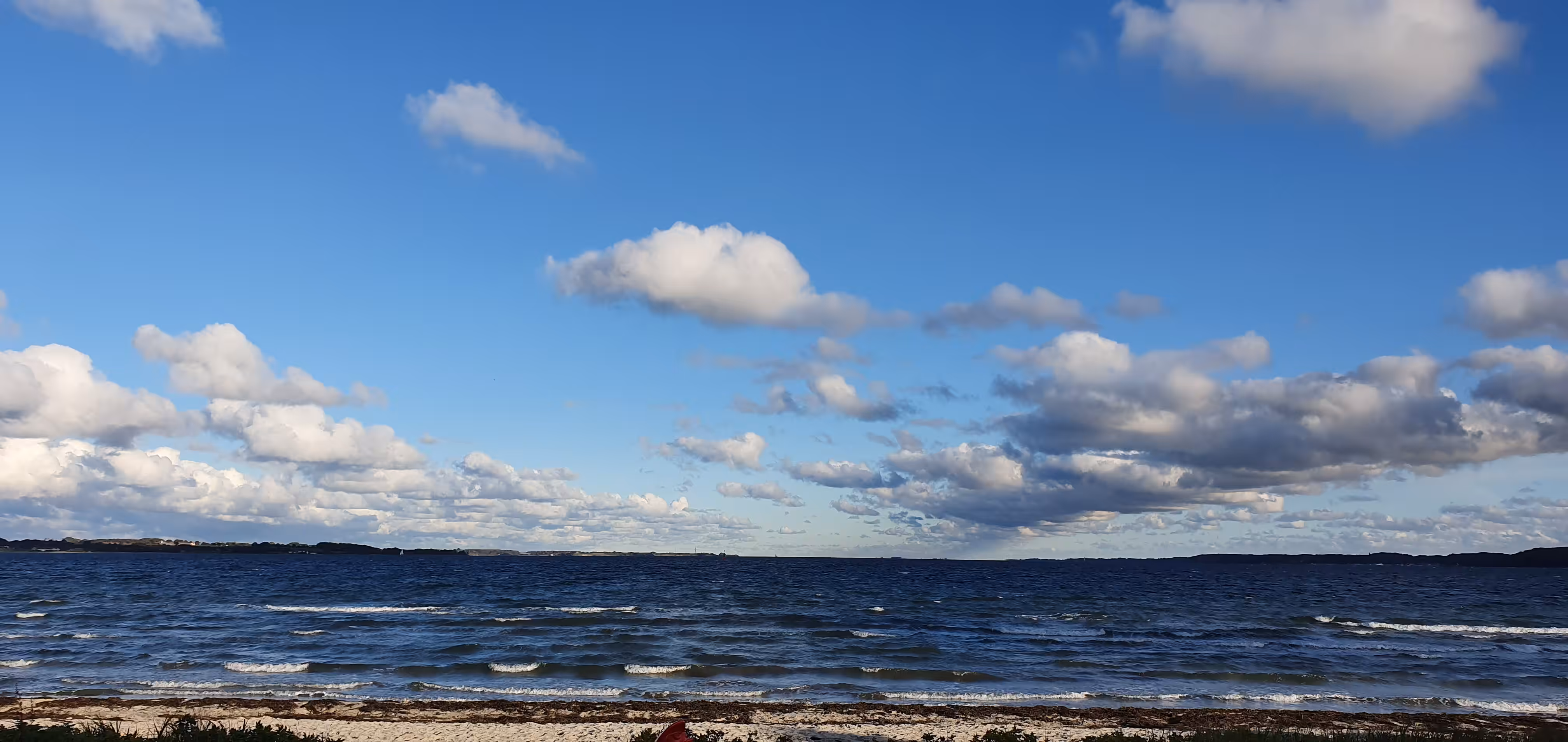 Serene Seascape: Where Azure Horizons Meet Tranquil Shores