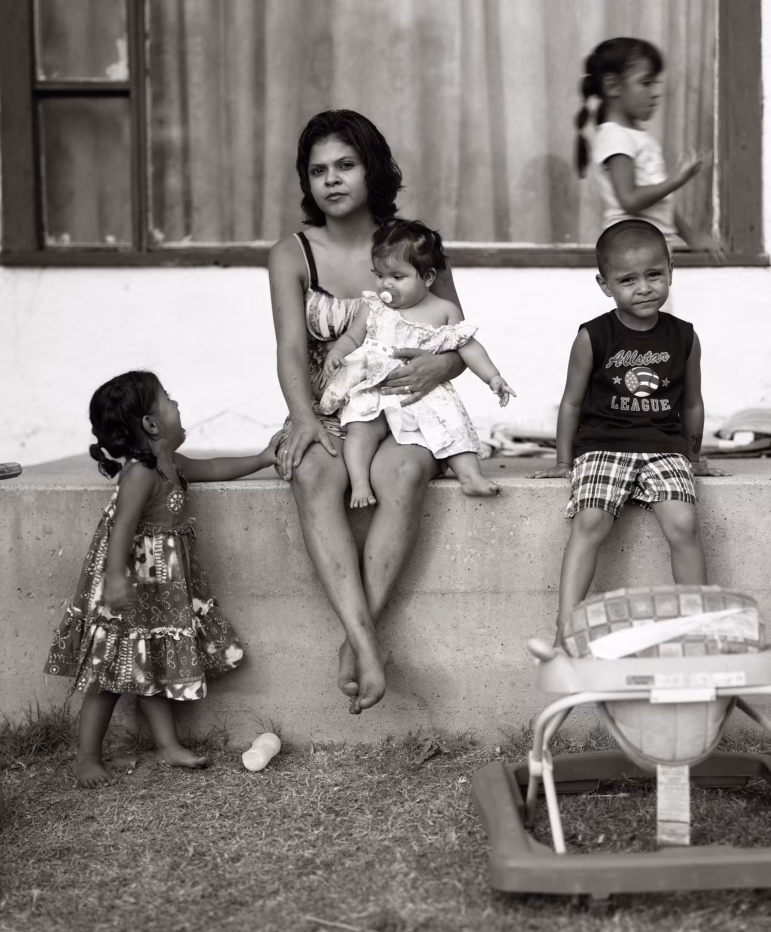Modesta with children, Pecos, Texas, 2011