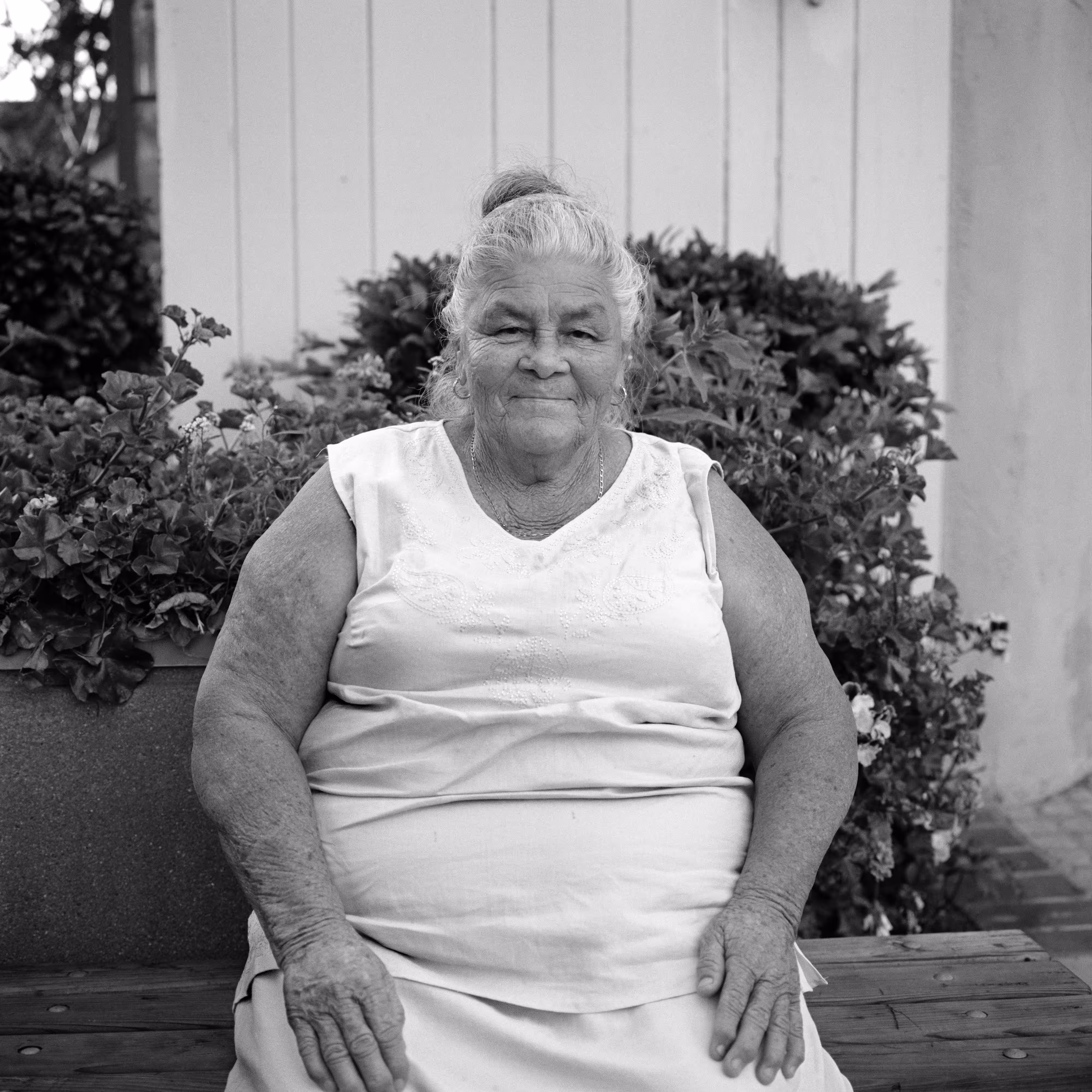 THE VILLAGE #37 PORTRAIT OF AN OLDER WOMAN IN TANK TOP by Deanna Templeton