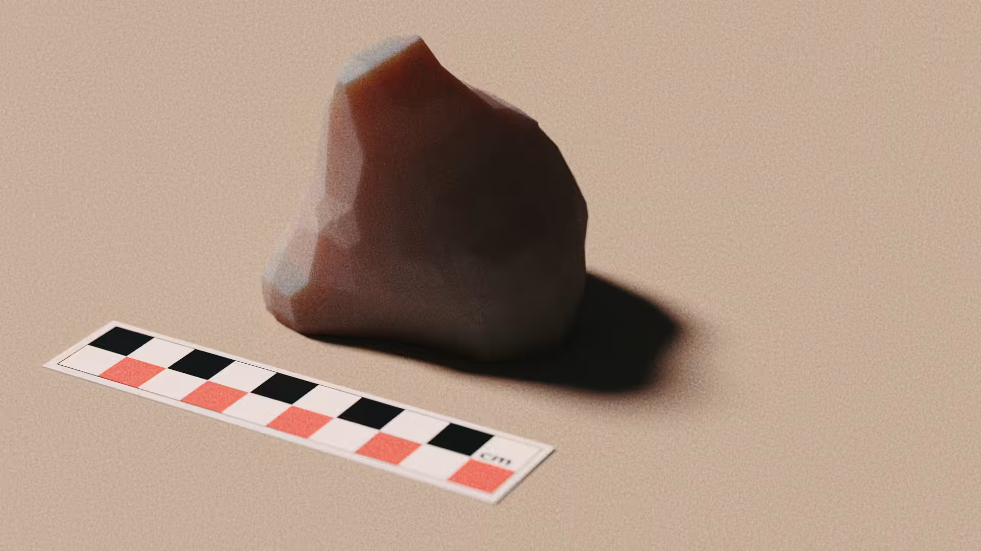 Artefact - a carved stone, side view