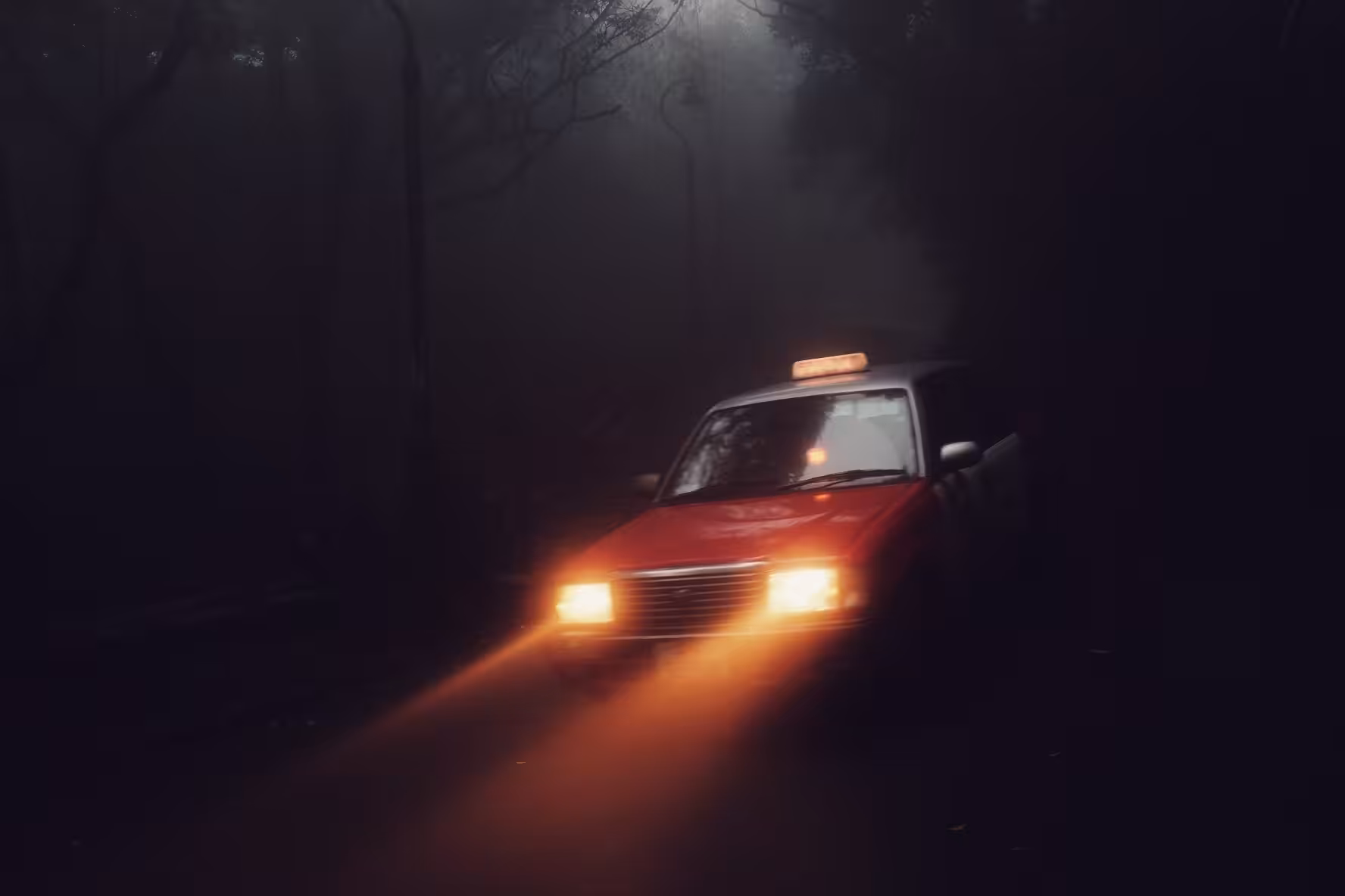 Taxi cutting thru the fog