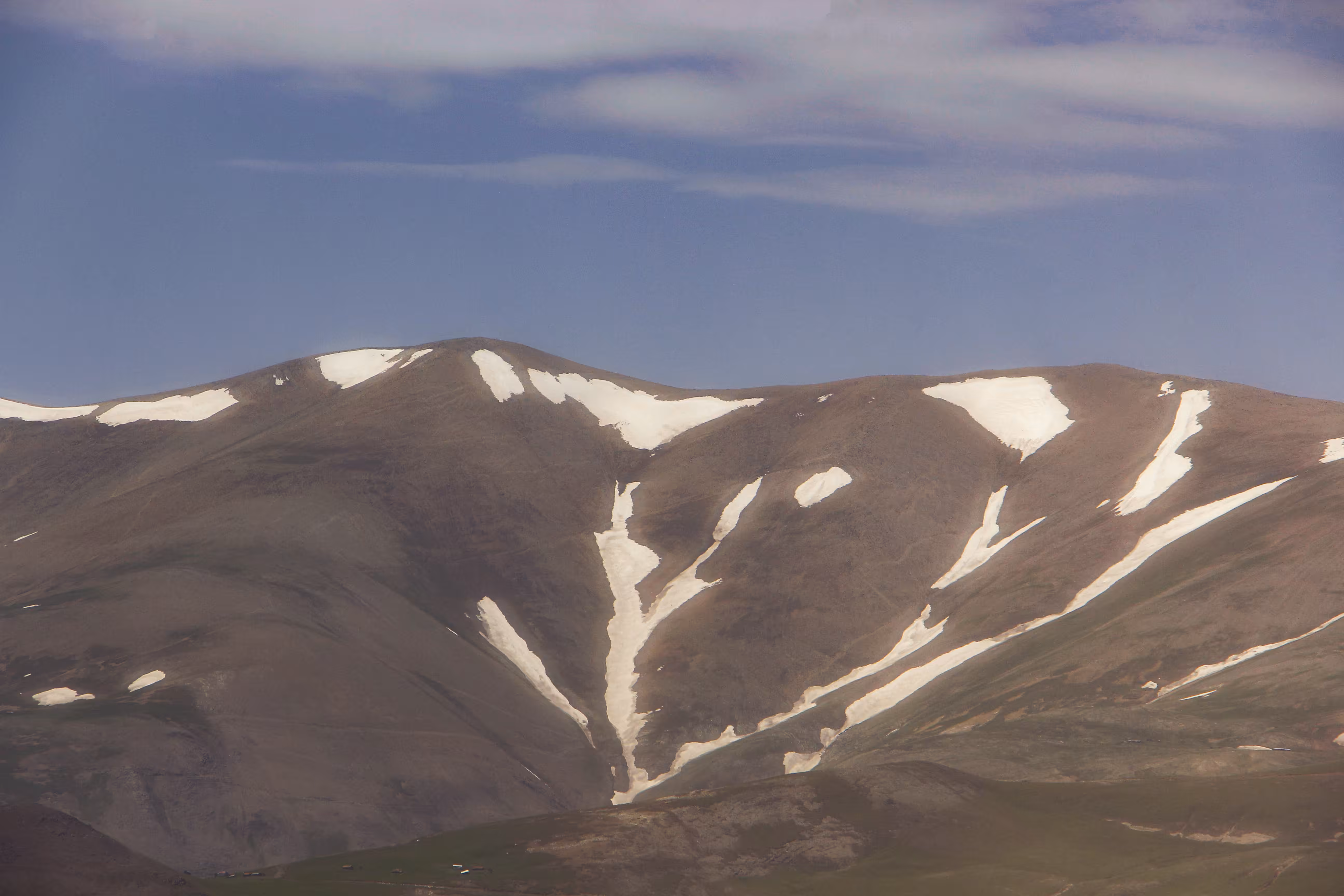 Light rests on quiet mountains