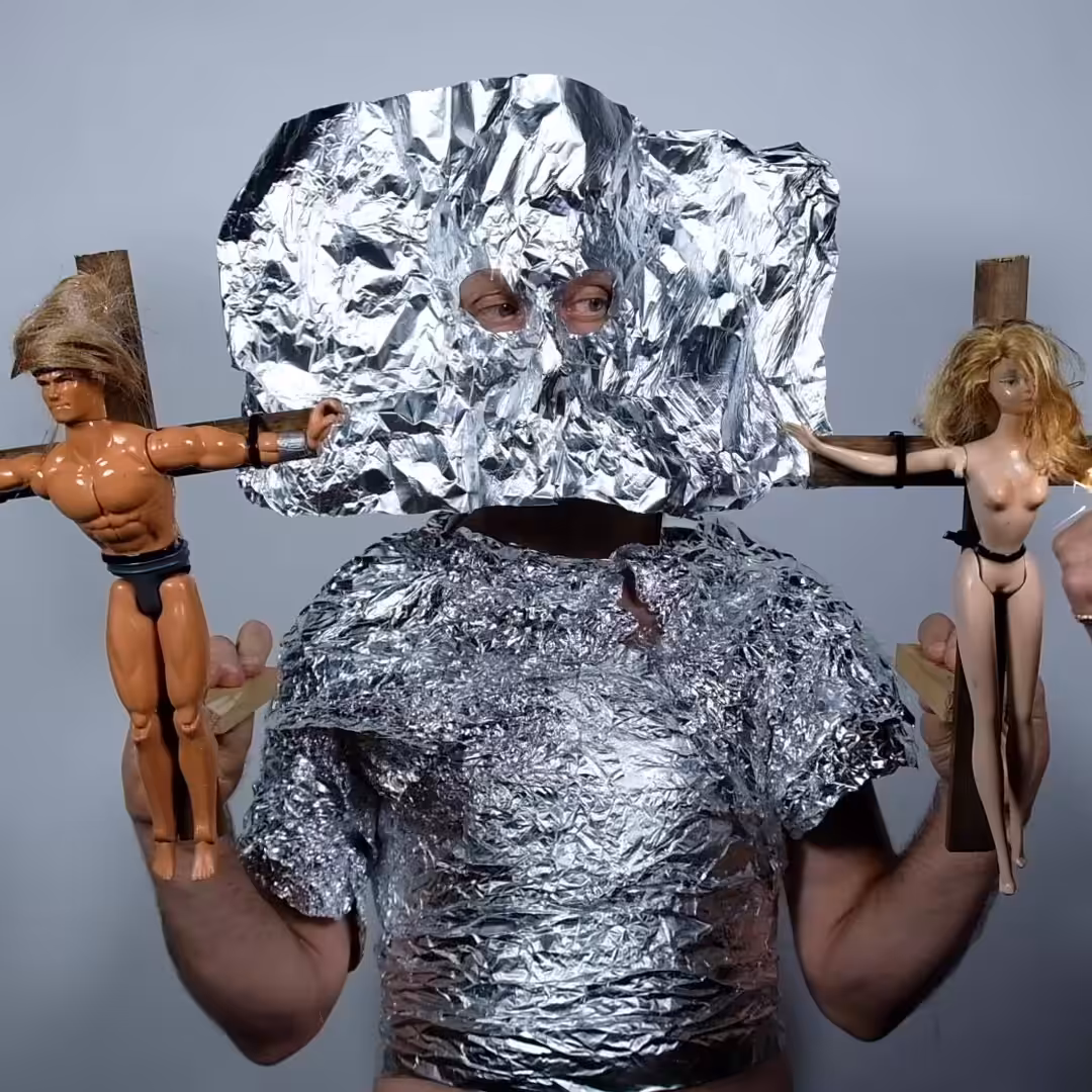 Burnt Barbie and Ken Crucifixion 